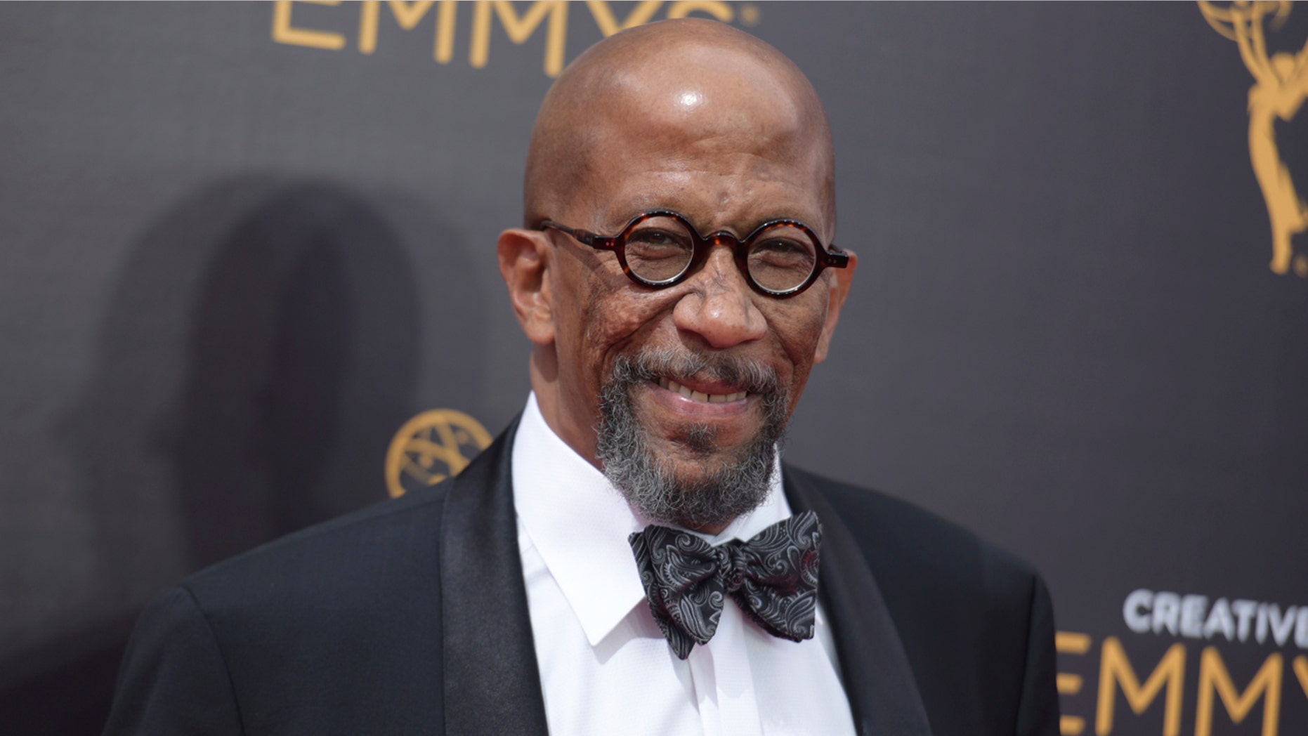 FILE - In this Sept. 10, 2016 file photo, Reg E. Cathey arrives at night one of the Creative Arts Emmy Awards at the Microsoft Theater in Los Angeles.