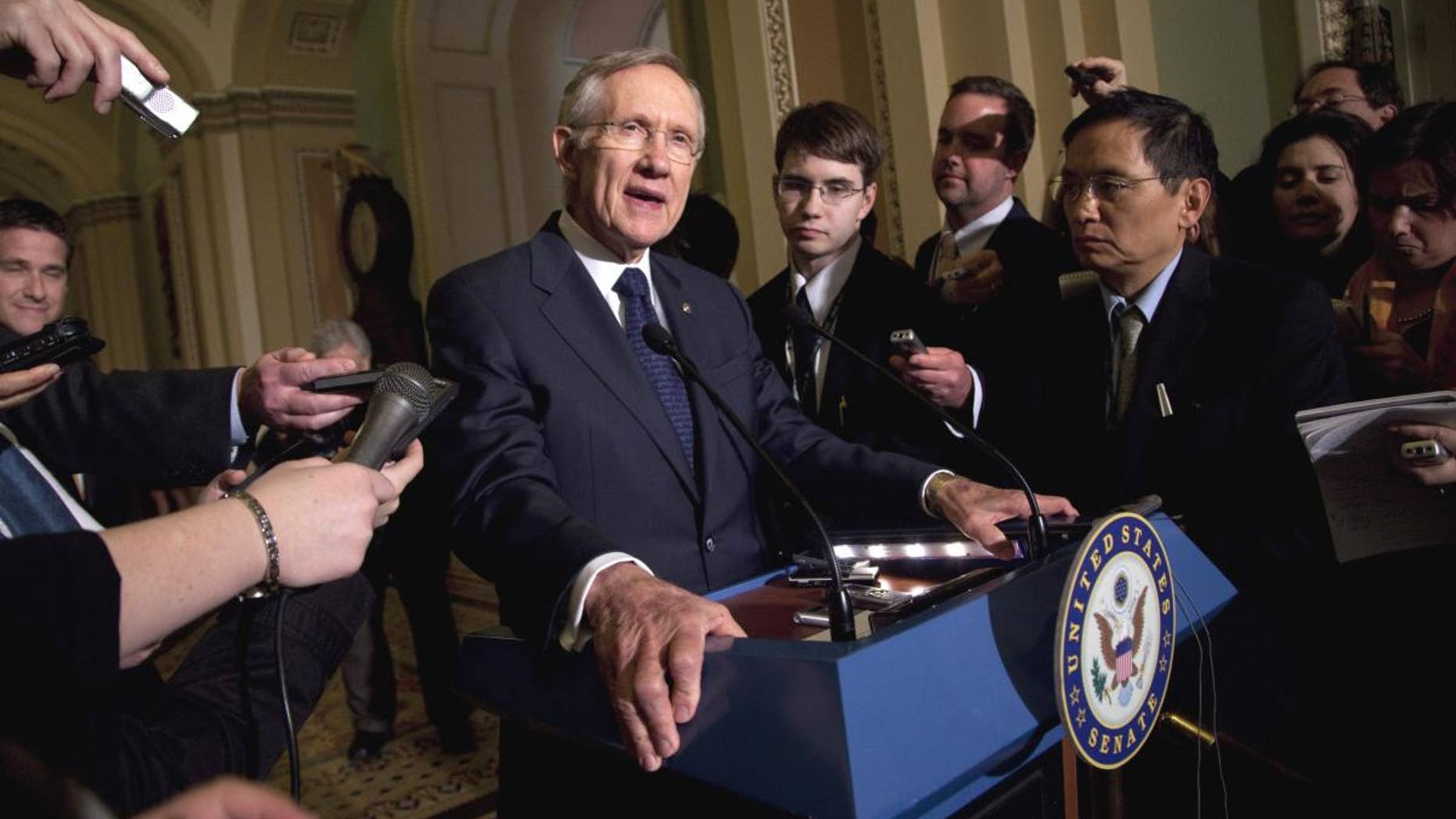 Senate Majority Leader Sen. Harry Reid, D- Nev., talks to the media after a Democratic policy luncheon on Tuesday, March 1, 2011, in Washington. (AP Photo/Evan Vucci)