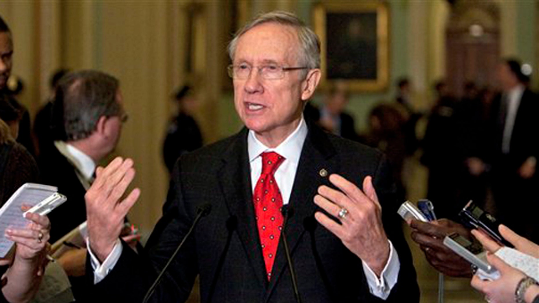 Senate Majority Leader Harry Reid talks to reporters in Washington Dec. 6. (AP Photo)