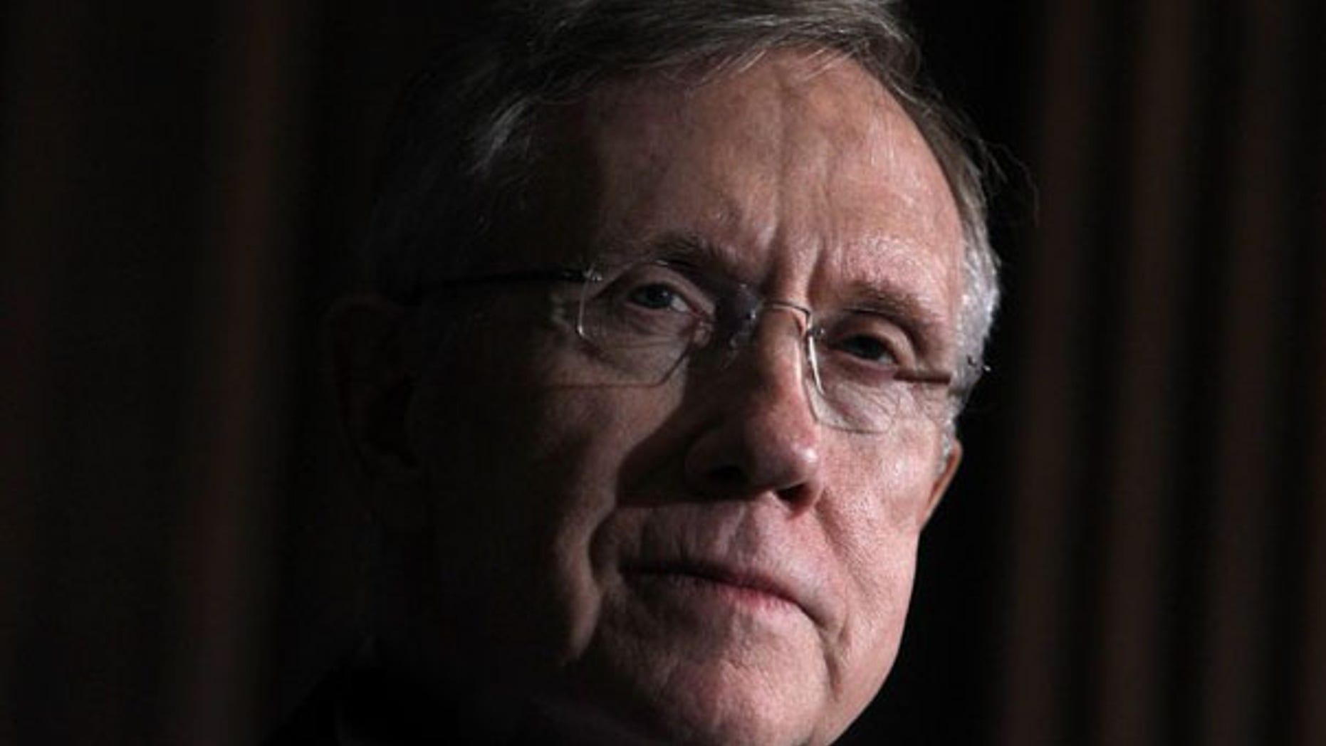 Senate Majority Leader Harry Reid listens to remarks in Washington March 25. (Reuters Photo)