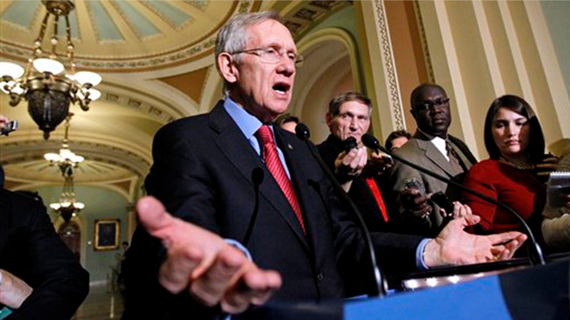 Senate Majority Leader Harry Reid gestures during a news conference on Capitol Hill Dec. 8. (AP Photo)