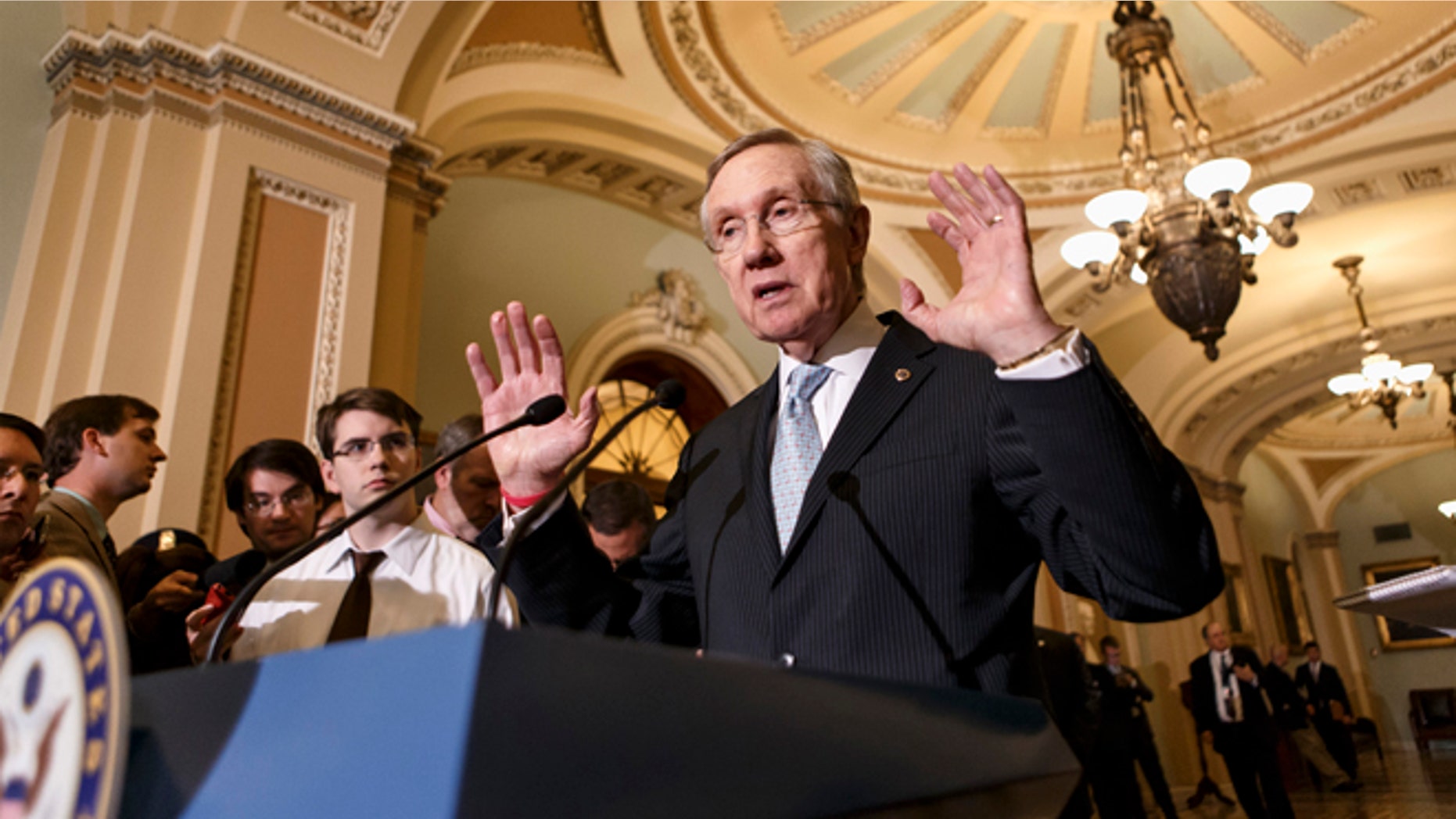 Sept. 24, 2013: Senate Majority Leader Harry Reid talks to reporters just off the Senate floor in Washington.