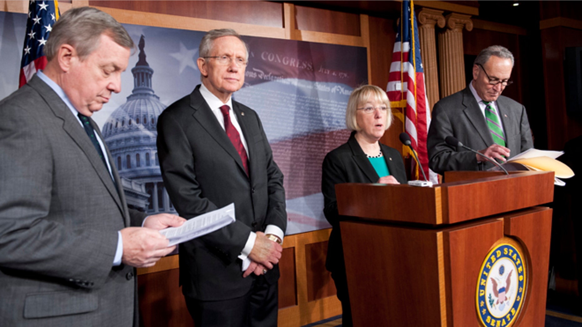 March 14, 2013: Sen. Dick Durbin, D-Ill., left, Senate Majority Leader Harry Reid, D-Nev., center right, Sen. Patty Murray, D-Wash., and Sen. Charles Schumer, D-N.Y., right, speak with reporters about the federal budget on Capitol Hill.