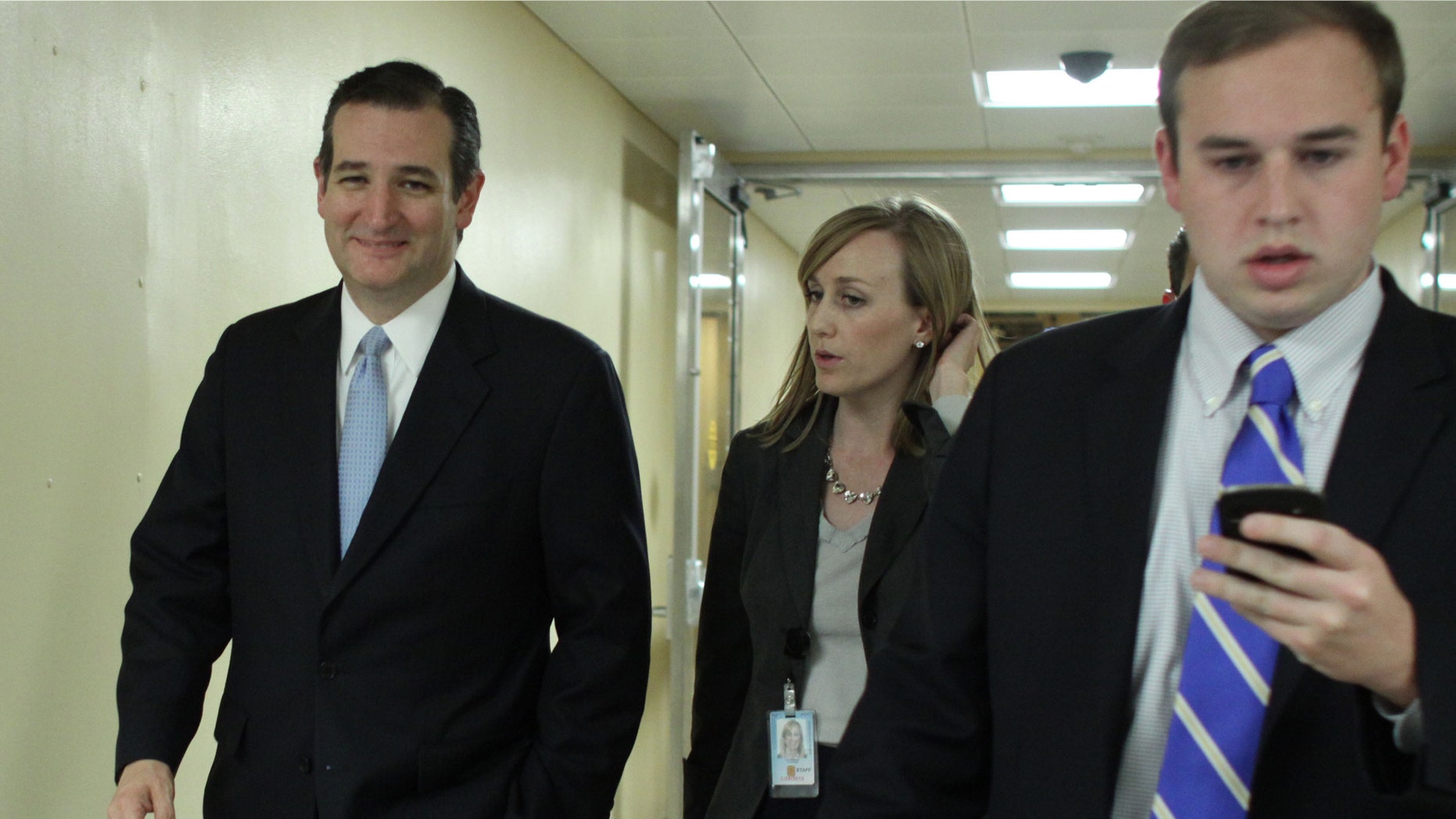 Sen. Cruz with his staff on Saturday, Dec. 13, 2014 after the Senate voted on a $1.1 trillion spending bill.