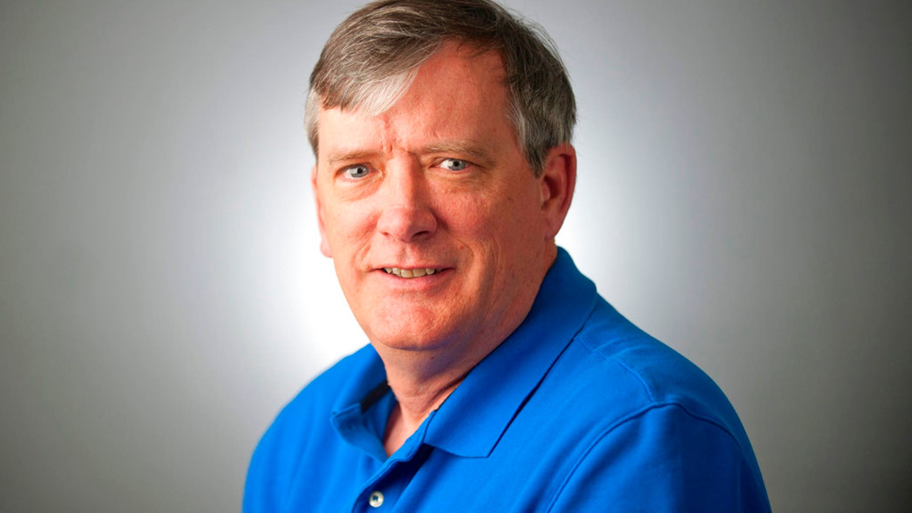 FILE - This undated file photo shows reporter John McNamara of the Capital Gazette, who was one of the victims when an active shooter targeted the newsroom, Thursday, June 28, 2018 in Annapolis, Md. The widow of the slain Maryland newspaper reporter, McNamara, has spread his ashes at Nationals Park. The Baltimore Sun reported that Andrea Chamblee placed the ashes of McNamara in a planter of begonias at the park Saturday, Sept. 1, 2018. (The Baltimore Sun via AP, File)
