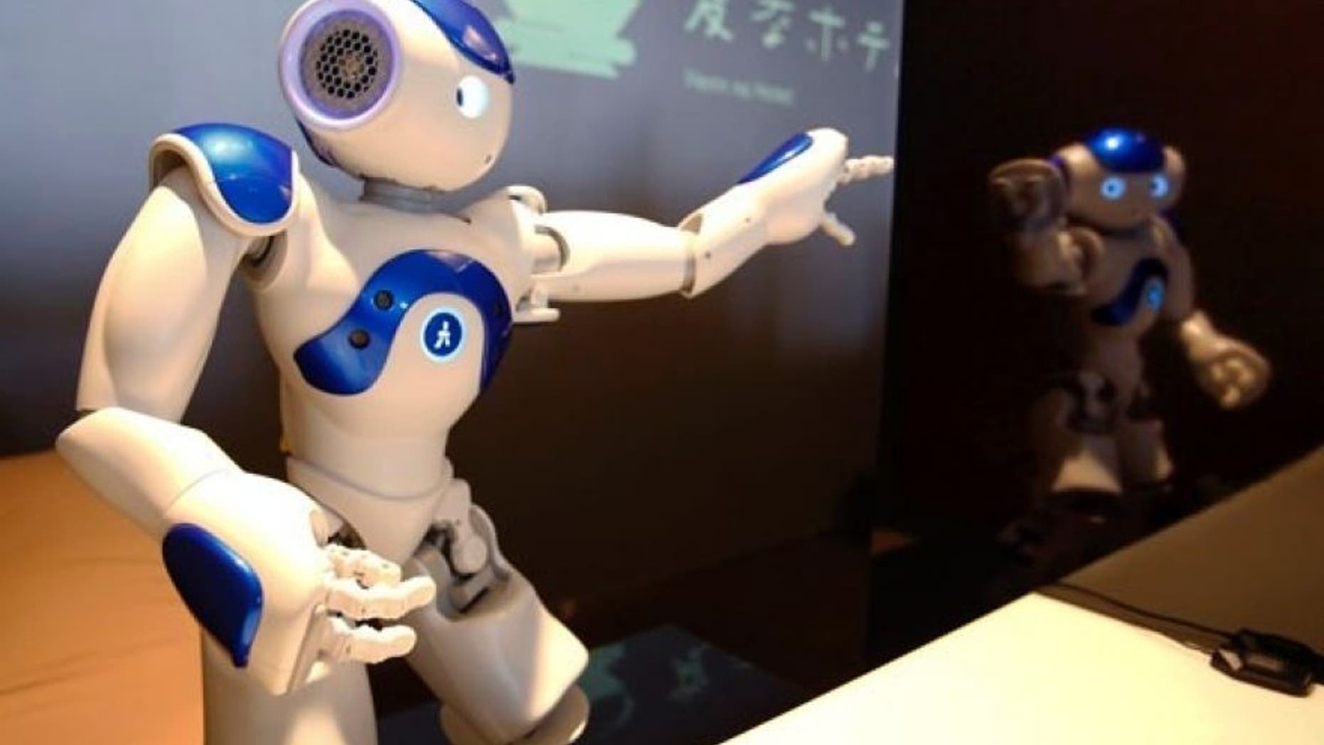 A receptionist robot performs during a demonstration ahead of the opening of Henn na Hotel, or Weird Hotel, in Sasebo, Japan, Wednesday, July 15, 201