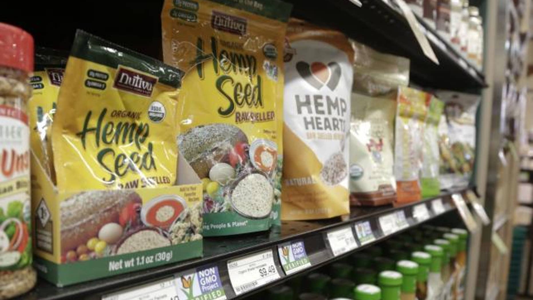 Labels point out products verified to not contain genetically modified organisms (GMO) at the Central Co-op in Seattle, Washington.