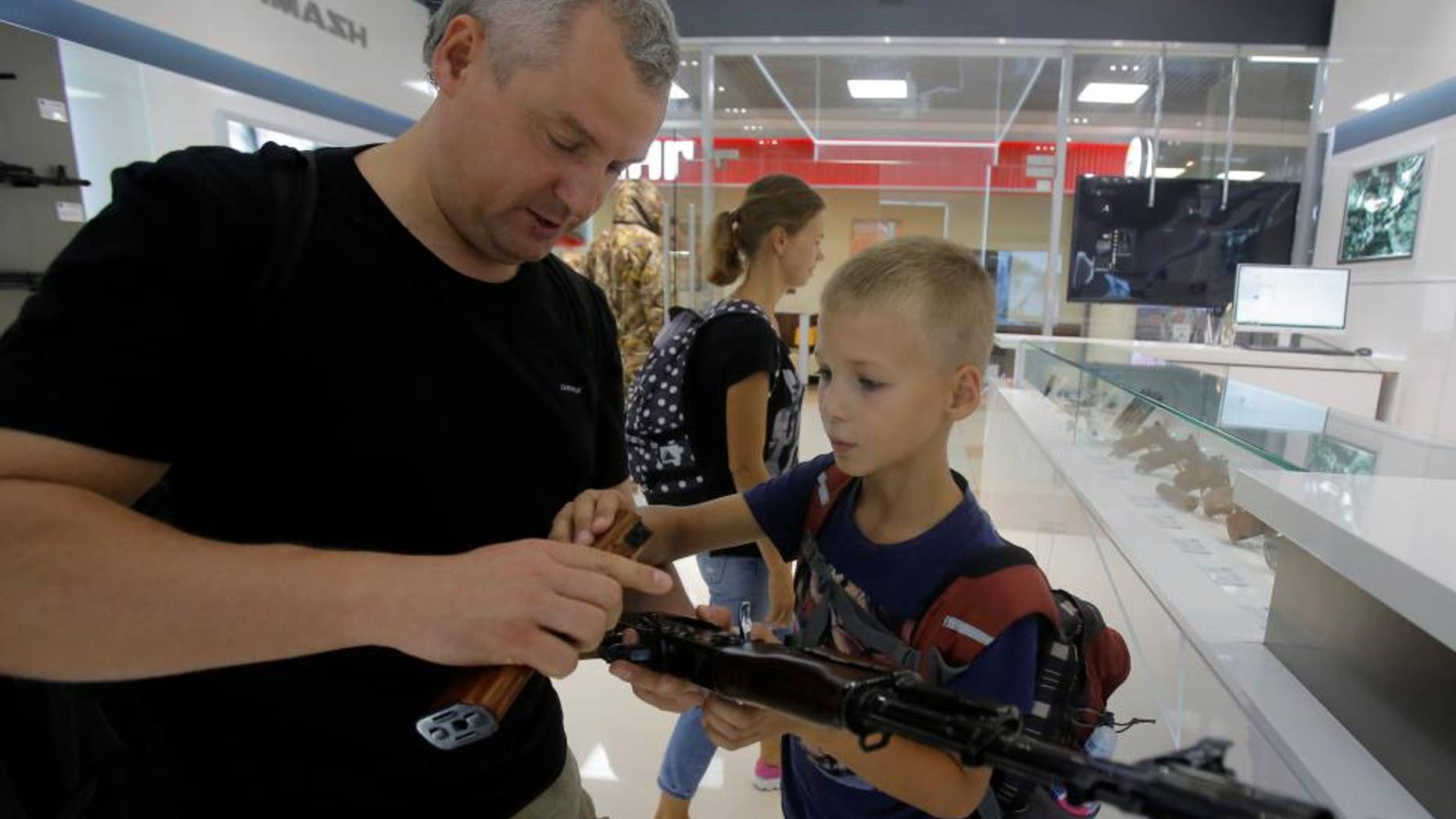 Kalashnikov, whose AK-47 assault rifle has armed Russian forces for 70 years and been the preferred weapon of insurgents across continents, has opened a store at Moscow's Sheremetyevo airport selling souvenirs including plastic model guns, the company said.
