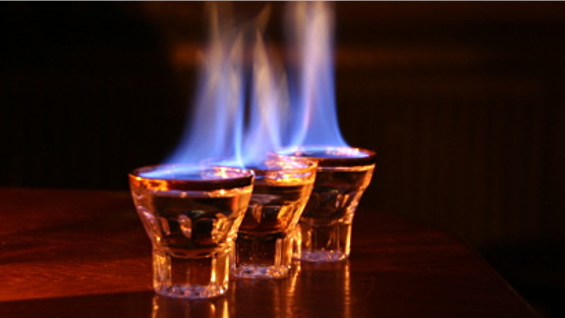 A flaming shot has severely injured a bar patron.