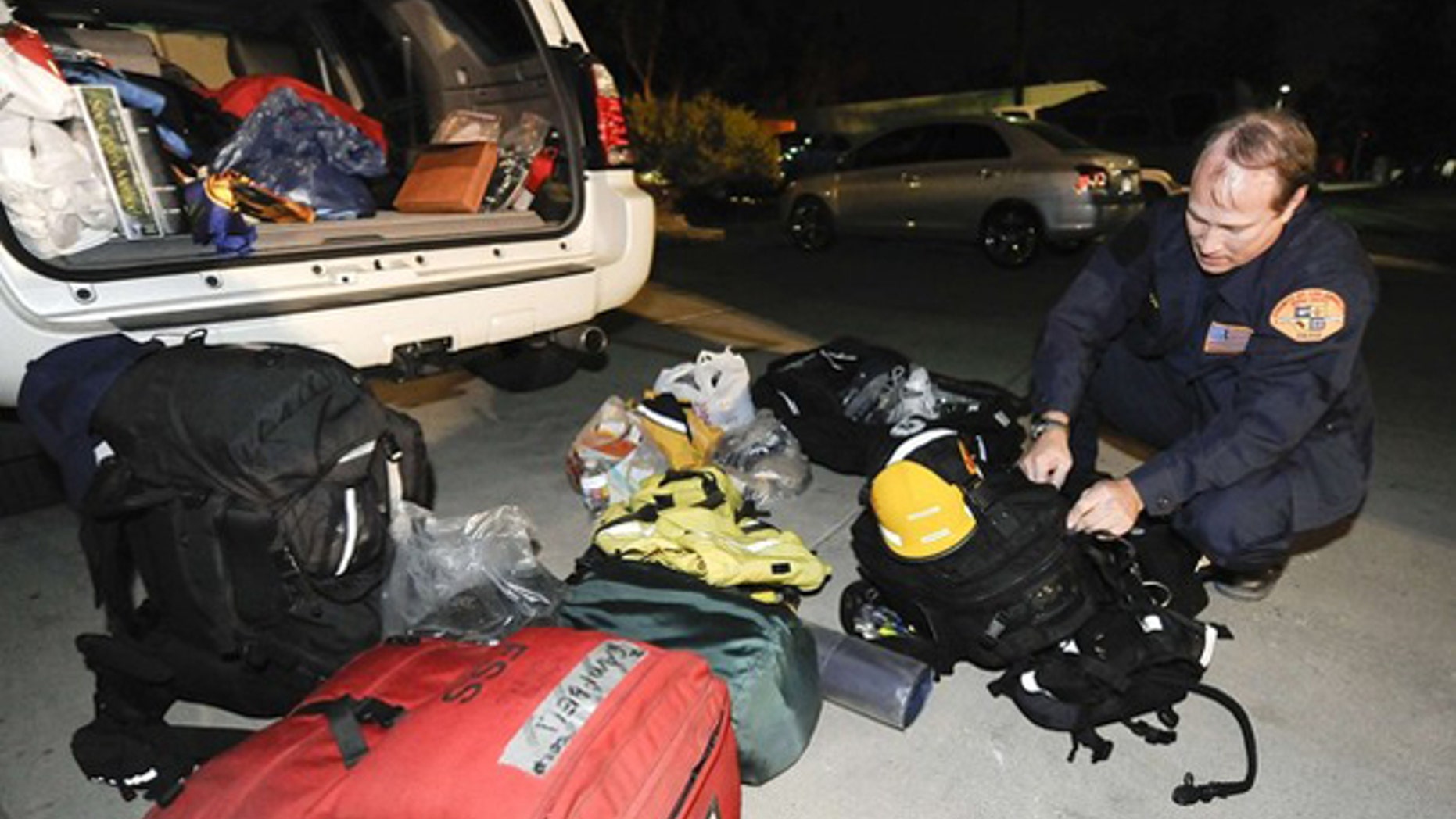 Los Angeles County Fire Department search-and-rescue technician Don Campbel prepares to depart for Haiti with his team Jan. 12. (Reuters Photo)