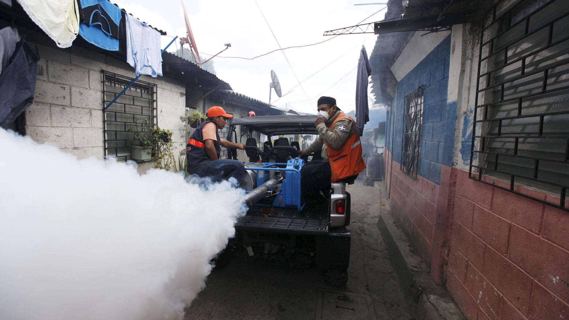 City health workers fumigate the Guadalupe community as part of preventive measures against the Zika virus and other mosquito-borne diseases in Santa Tecla, El Salvador February 3, 2016.