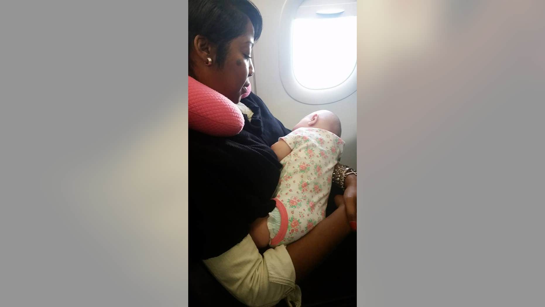 Nyfesha Miller stepped in to help quiet a stranger's newborn on a long flight.