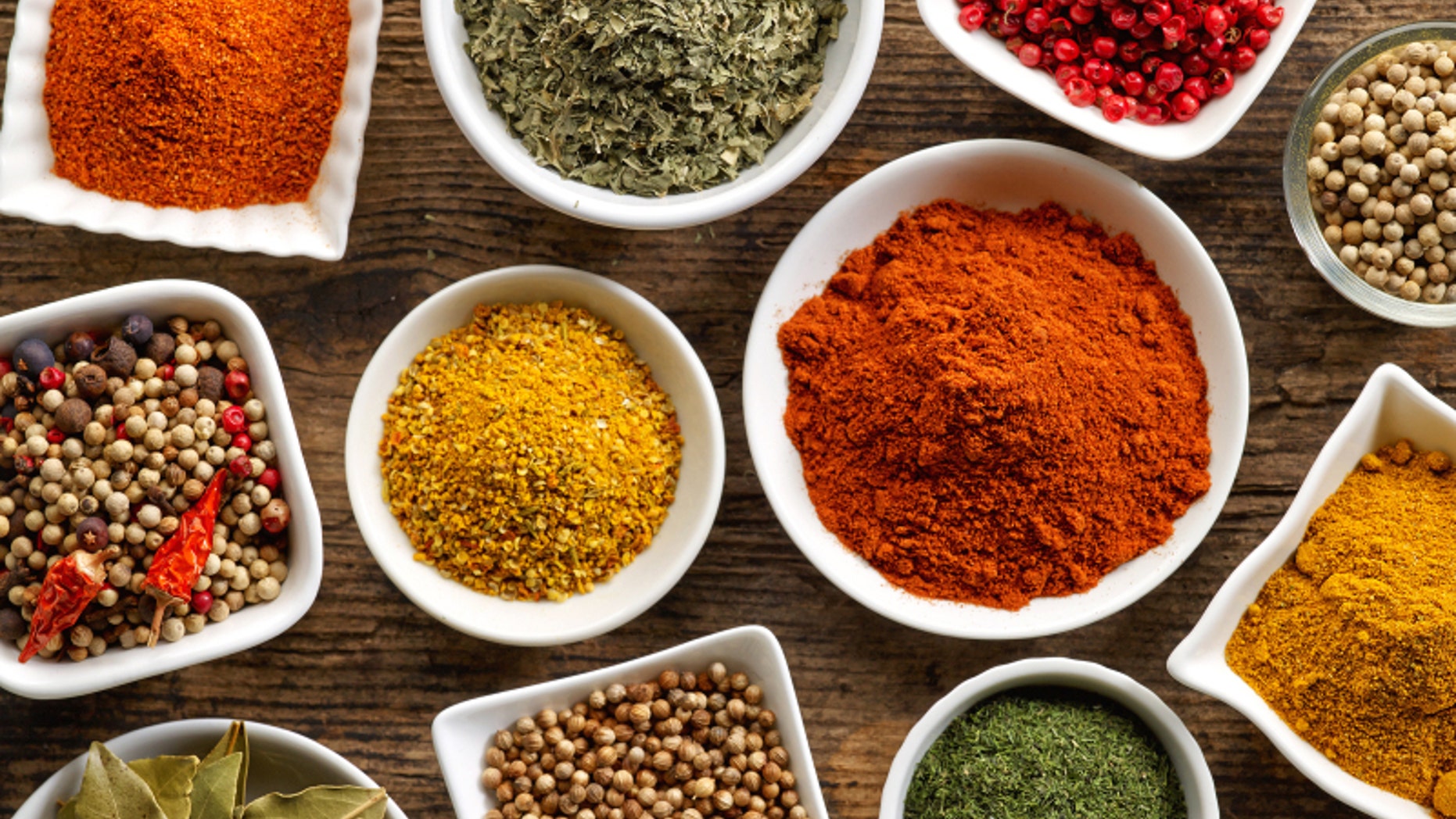 various spices on wooden table