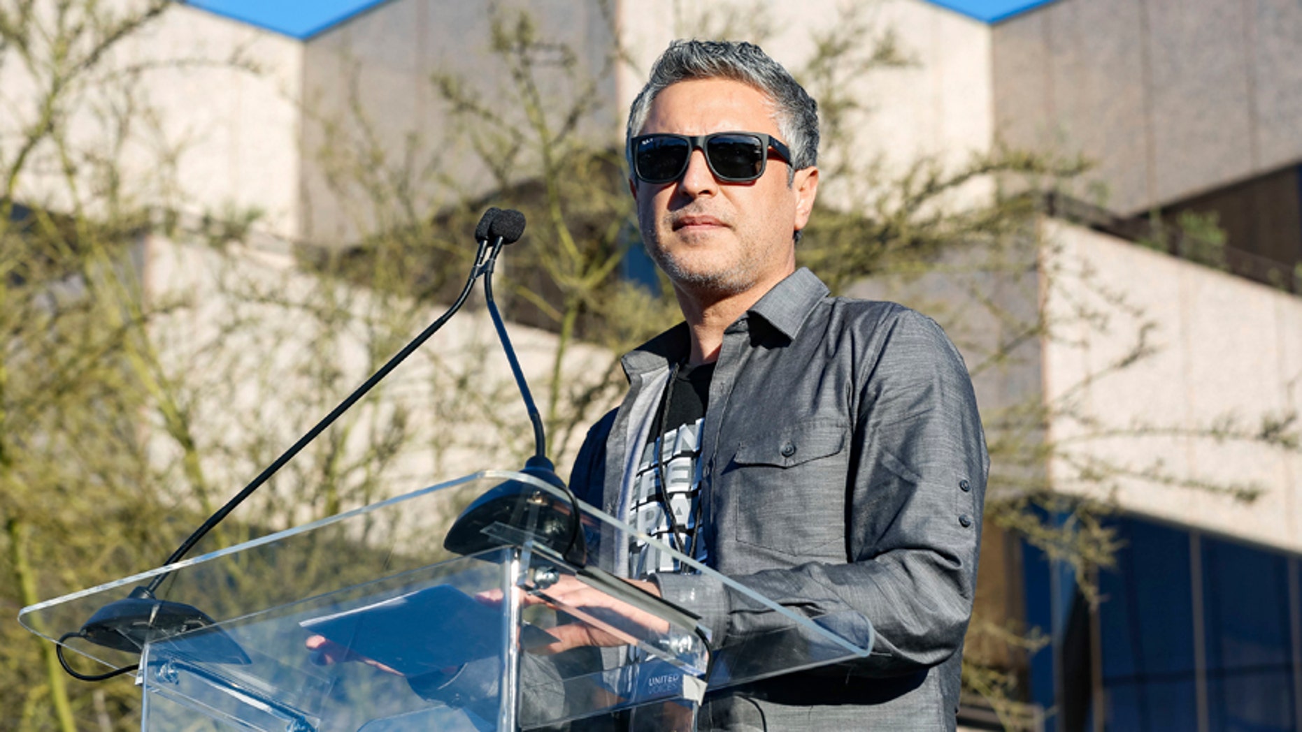 Reza Aslan speaks at the UTA "United Voices" Rally at United Talent Agency headquarters on Friday, Feb. 24, 2017, in Beverly Hills, Calif. He is the host of the new CNN show "Believer."