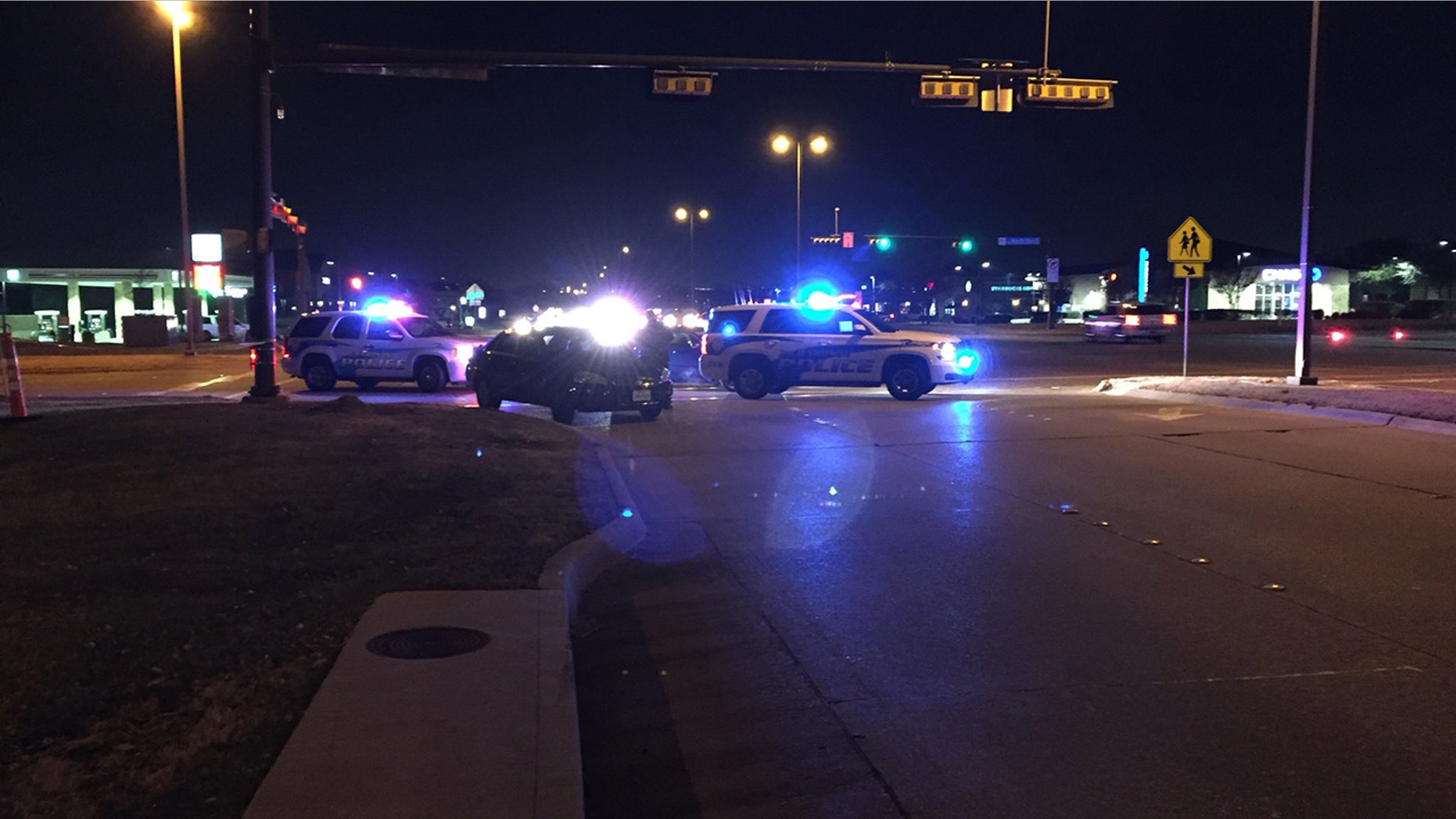 Richardson police close off roads while responding to a report of a disturbance call.