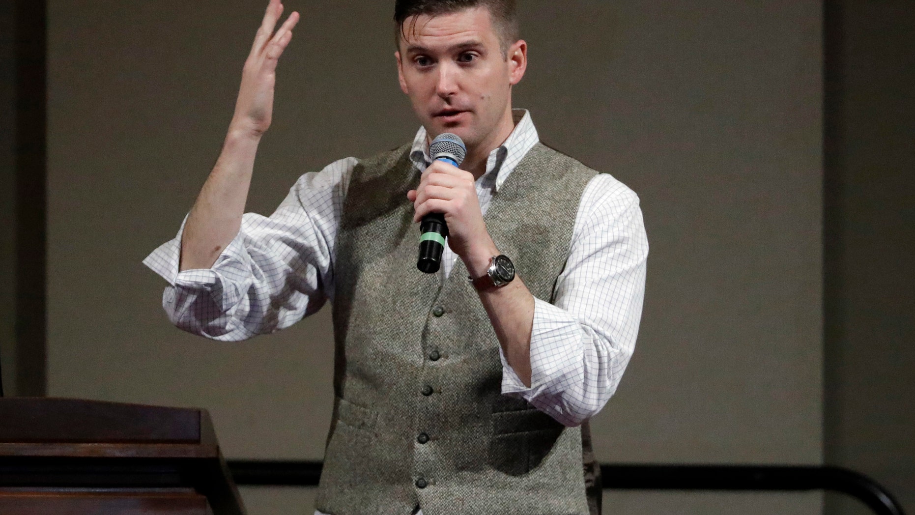 FILE - In this Dec. 6, 2016 file photo, Richard Spencer speaks at the Texas A&M University campus in College Station, Texas. Twitter has restored Spencer's personal account less than a month after the social media company suspended it along with other accounts belonging to prominent members of the so-called "alt-right" movement. The company told Spencer that it suspended five of his accounts on Nov. 15 for violating a rule against creating multiple accounts with overlapping uses. (AP Photo/David J. Phillip)