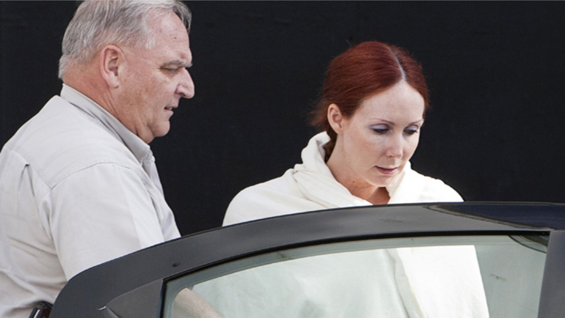 June, 7, 2013: In this file photo, Shannon Richardson is escorted to a Titus County Sheriff's car after a court appearance in Texarkana, Texas. (AP)