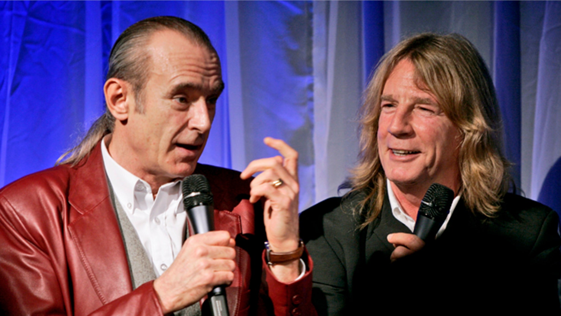 Status Quo members Francis Rossi (left) and Rick Parfitt. Parfitt has died at age 68.