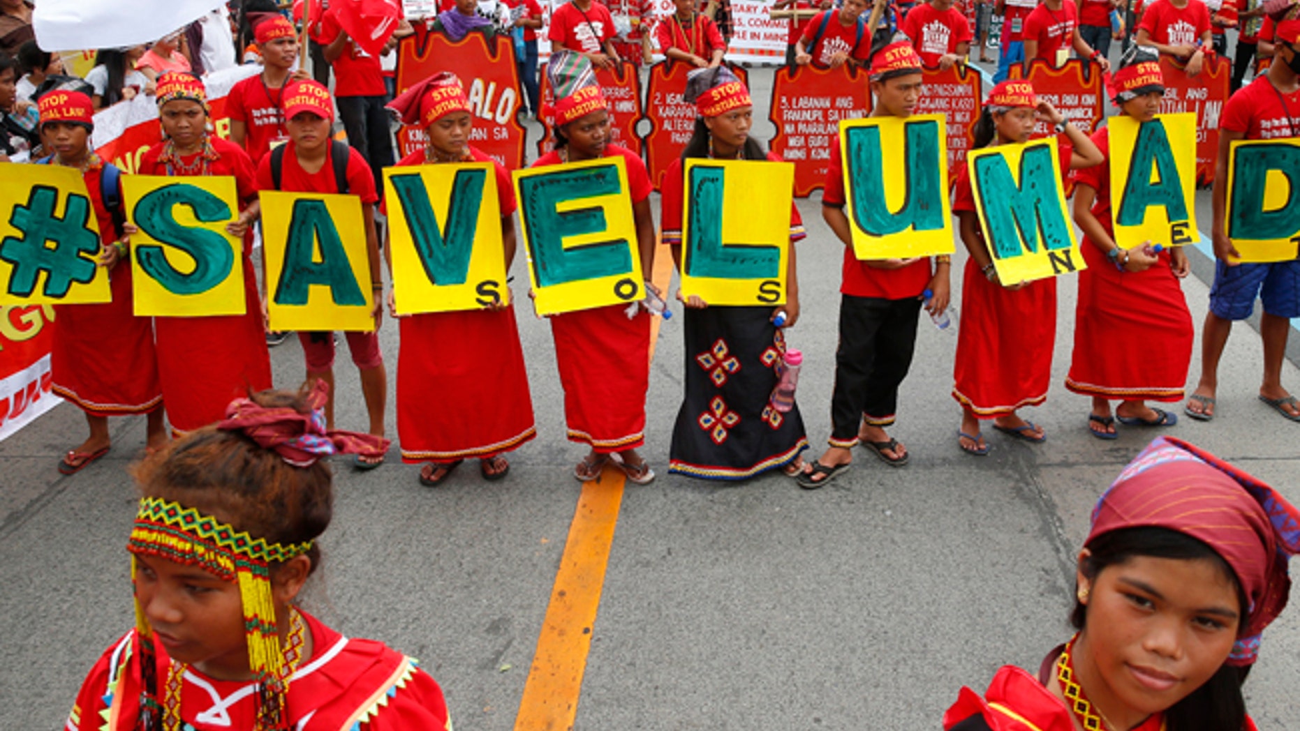 Young indigenous people known as Lumads march to coincide with Philippine President Rodrigo Duterte's state of the nation address.