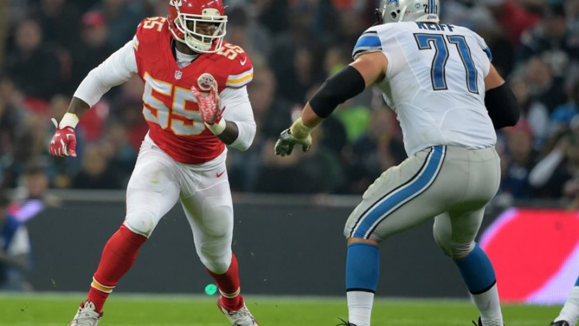 Nov 1, 2015; London, United Kingdom; Kansas City Chiefs linebacker Dee Ford (55) attempts to get past Detroit Lions tackle Riley Reiff (71) during game 14 of the NFL International Series at Wembley Stadum. The Chiefs defeated the Lions 45-10. Mandatory Credit: Kirby Lee-USA TODAY Sports