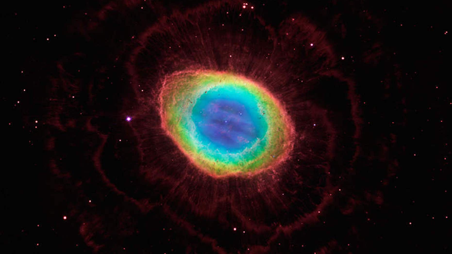 A composite image of the Ring Nebula captured using data from the Hubble Space Telescope Wide Field Camera 3 and the Large Binocular Telescope (LBT) in Arizona.