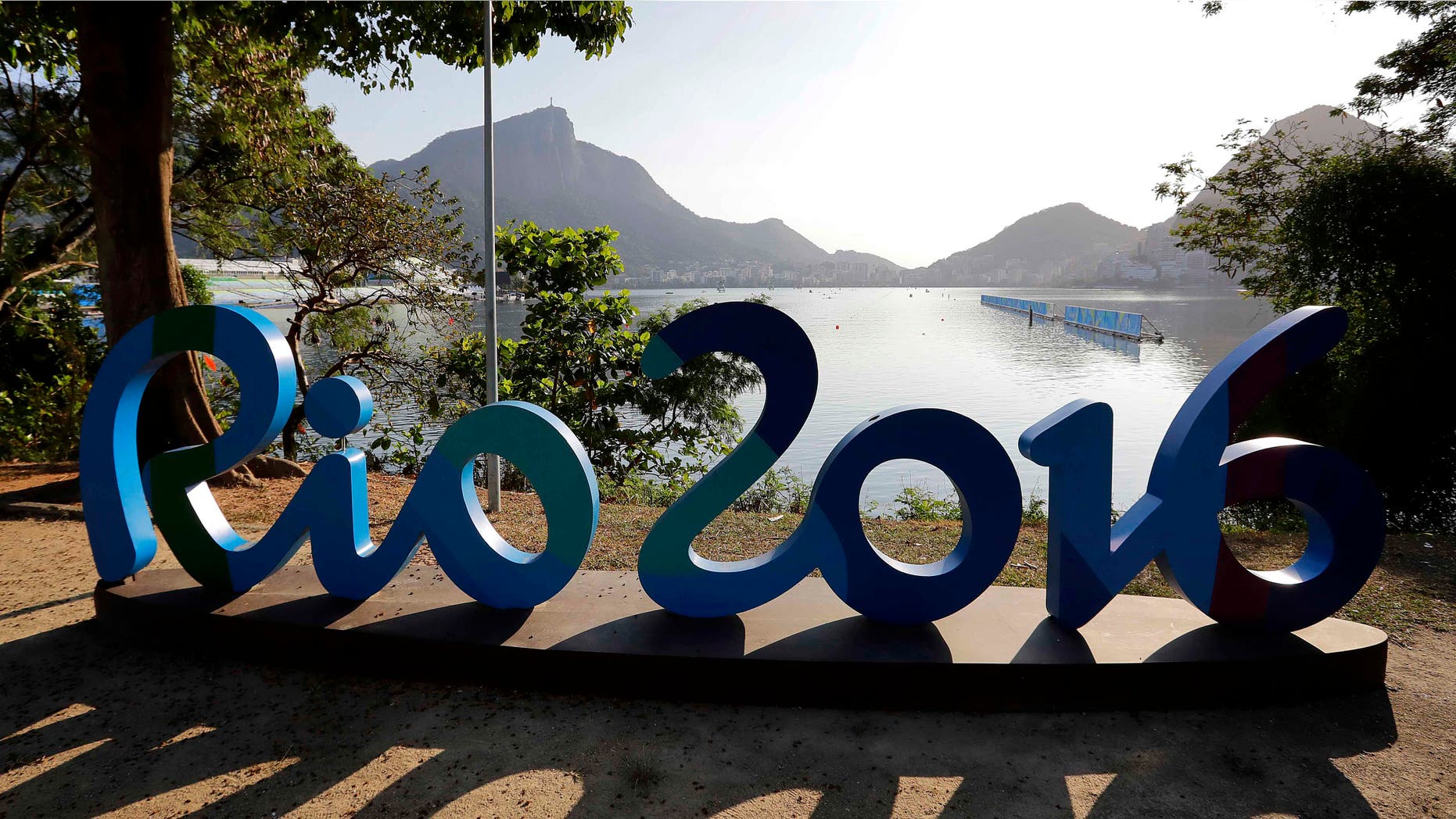 Rowers warm up during rowing team practices in Lagoa ahead of the 2016 Summer Olympics in Rio de Janeiro, Brazil, Friday, Aug. 5, 2016. (AP Photo/Matt York)