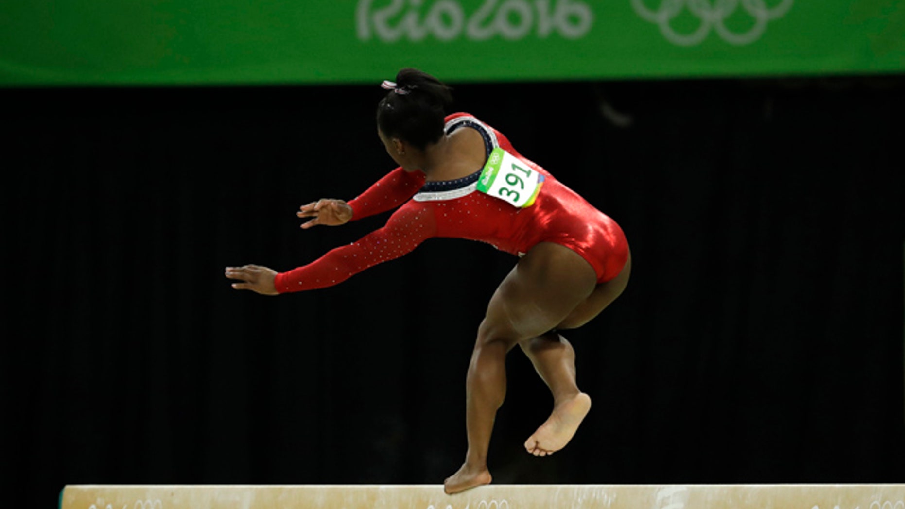 United States' Simone Biles stumbles during her performance on the balance beam during the artistic gymnastics women's apparatus final at the 2016 Summer Olympics in Rio de Janeiro, Brazil, Monday, Aug. 15, 2016.