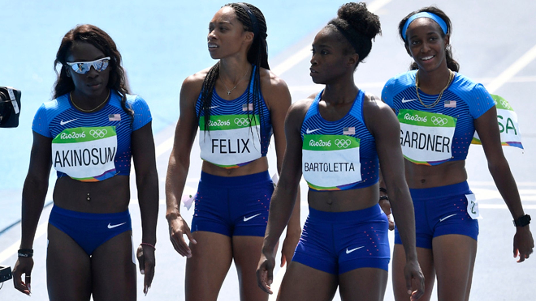 From left, the United States 4x100-meter relay team Morolake Akinosun, Allyson Felix, Tianna Bartoletta and English Gardner after a women's 4x100-meter relay heat during the athletics competitions of the 2016 Summer Olympics at the Olympic stadium in Rio de Janeiro, Brazil, Thursday, Aug. 18, 2016.