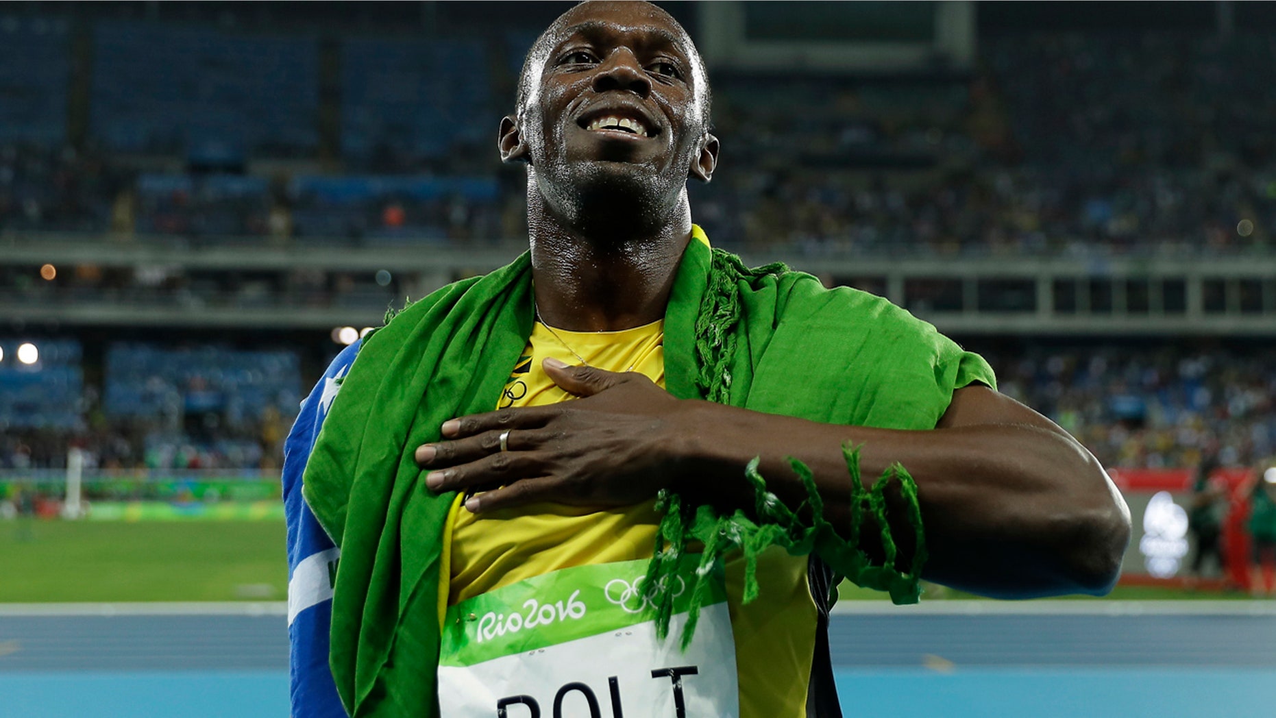 Usain Bolt from Jamaica celebrates after winning the gold medal in the men's 200-meter final, during the athletics competitions of the 2016 Summer Olympics at the Olympic stadium in Rio de Janeiro, Brazil, Thursday, Aug. 18, 2016. (AP Photo/Matt Slocum)