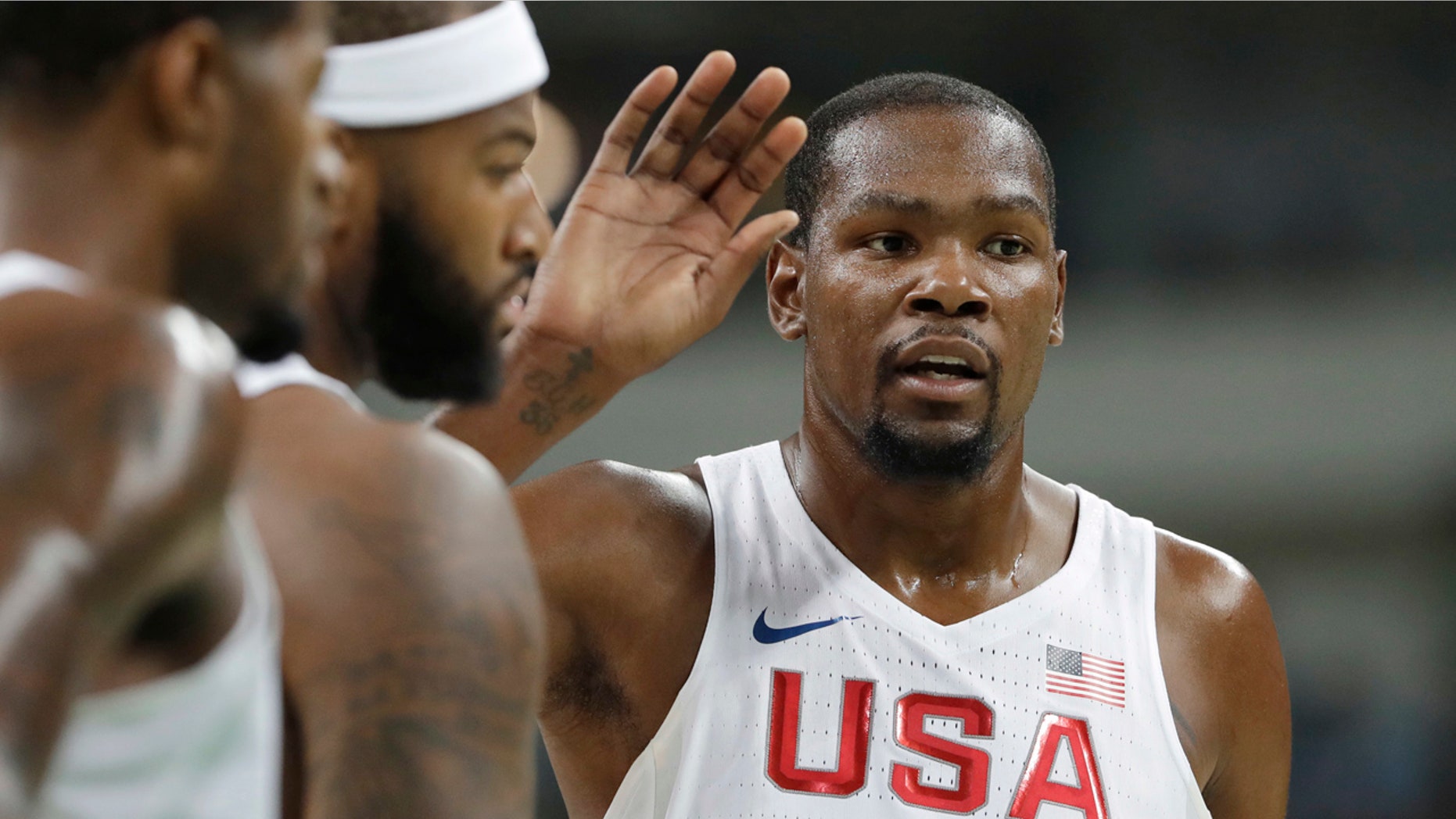 Aug. 17, 2016: United States' Kevin Durant, right, celebrates a play with teammates during a men's quarterfinal round basketball game against Argentina at the 2016 Summer Olympics in Rio de Janeiro, Brazil