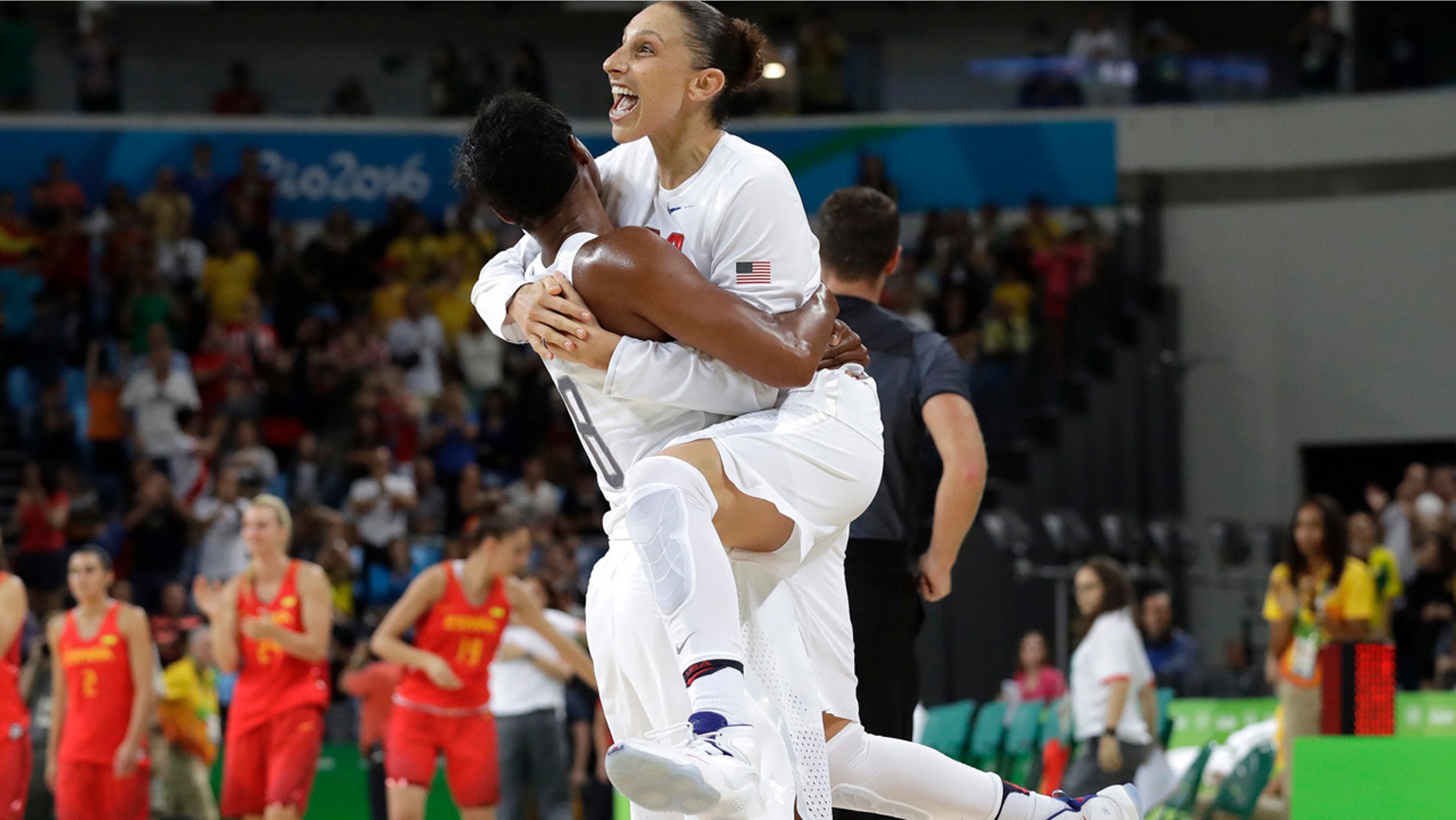 Aug. 20, 2016: United States' Diana Taurasi, right, leaps into the arms of teammate Angel McCoughtry as they celebrate their win over Spain in the women's gold medal basketball game at the 2016 Summer Olympics in Rio de Janeiro, Brazil.