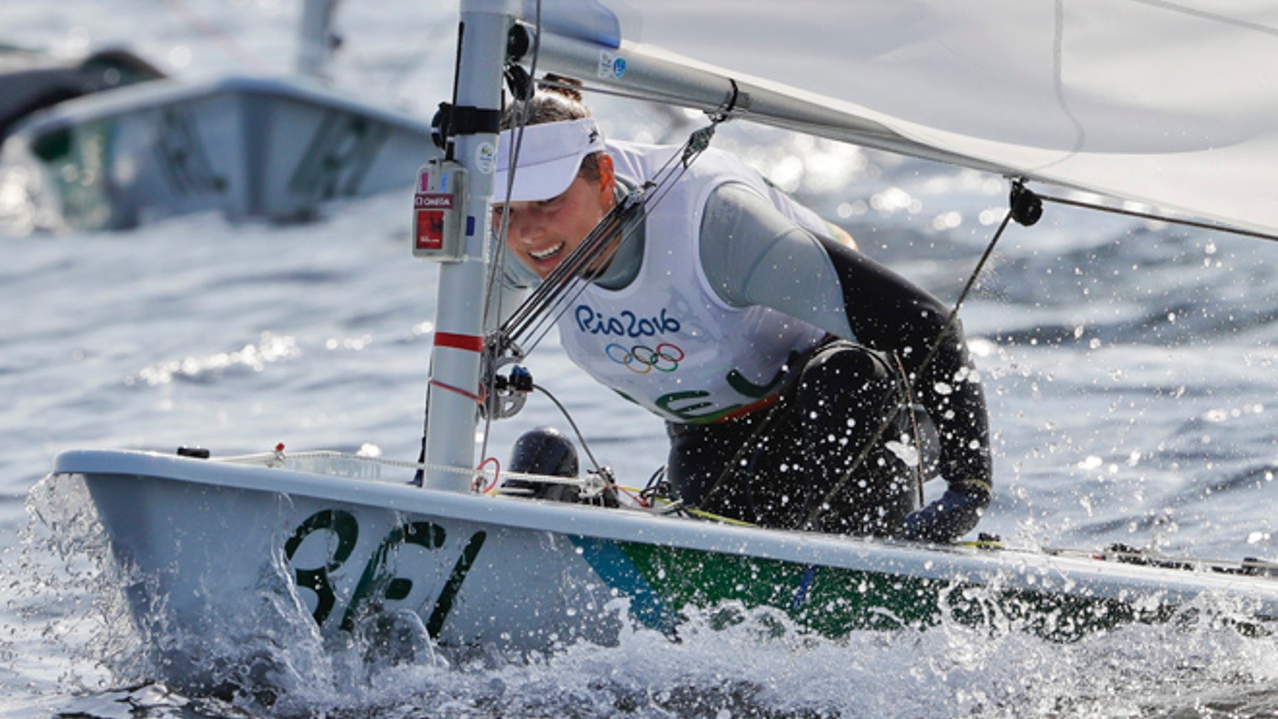 In this picture taken Tuesday, Aug. 9, 2016, Belgium's Evi Van Acker competes during the Laser Radial women event at the 2016 Summer Olympics in Rio de Janeiro, Brazil. Van Acker reported feeling sick after races Wednesday, Aug. 10, the governing body World Sailing said.
