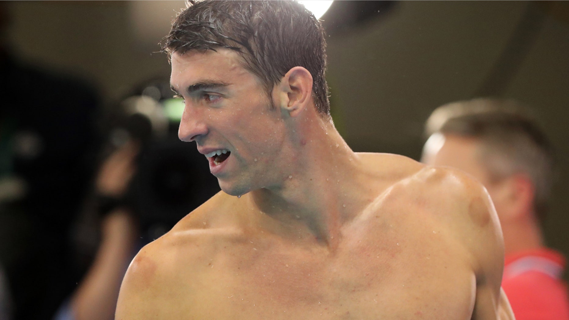 Aug, 13, 2016: United States' Michael Phelps leaves the pool deck after his team won gold in the men's 4 x 100-meter medley relay final during the swimming competitions at the 2016 Summer Olympics in Rio de Janeiro, Brazil.