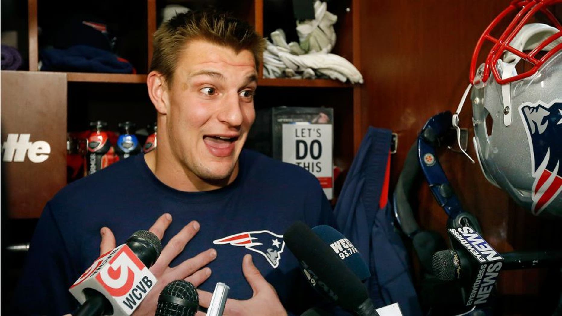 New England Patriots football tight end Rob Gronkowski speaks to media at his locker in Foxborough, Mass., Friday, Jan. 23, 2015. The Patriots face the Seattle Seahawks in NFL football's Super Bowl XLIX on Sunday, Feb. 1, 2015, in Glendale, Ariz. (AP Photo/Elise Amendola)