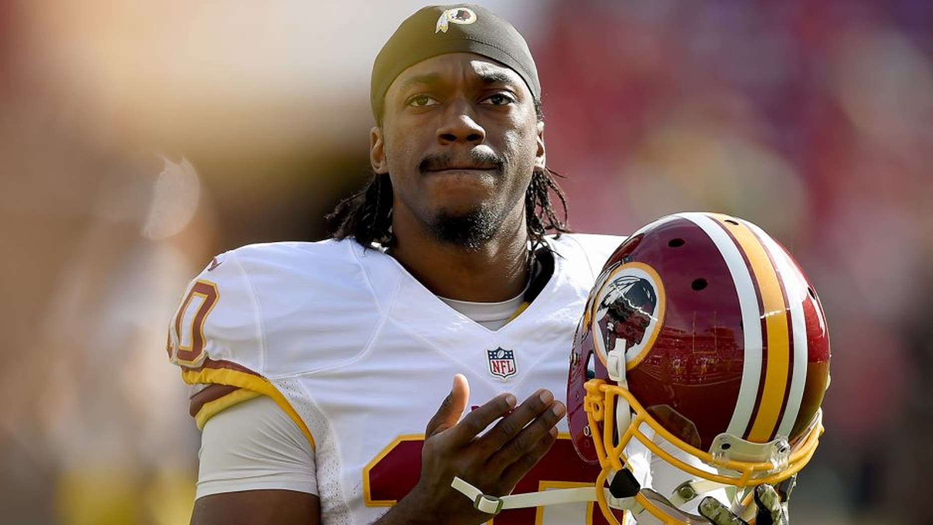 SANTA CLARA, CA - NOVEMBER 23: Robert Griffin III #10 of the Washington Redskins looks on during pre-game warm ups prior to playing the San Francisco 49ers at Levi's Stadium on November 23, 2014 in Santa Clara, California. (Photo by Thearon W. Henderson/Getty Images)