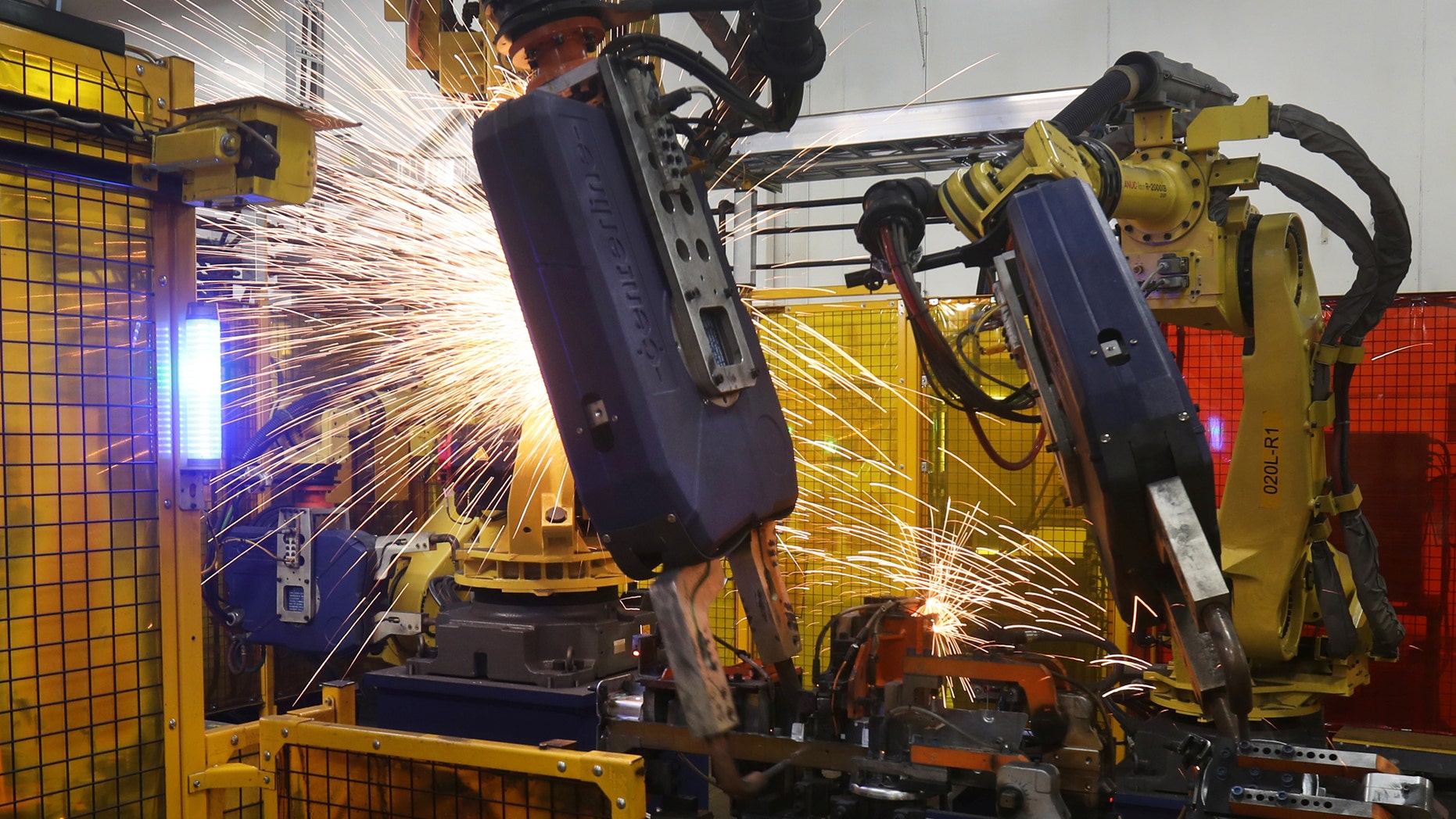 File photo: Robot welders on the floor of Alfield Industries, a subsidiary of Martinrea, one of three global auto parts makers in Canada, in Vaughan, Ontario, Canada April 28, 2017. Picture taken April 28, 2017. (REUTERS/Fred Thornhill)