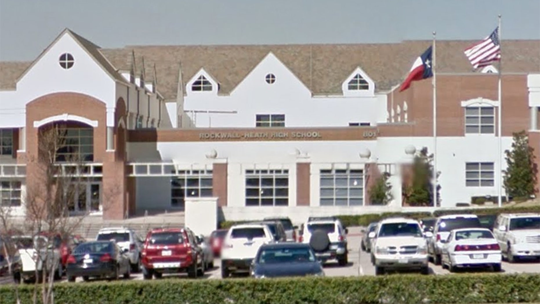 Rockwall-Heath High School says it has suspended its girl's varsity soccer team coach.