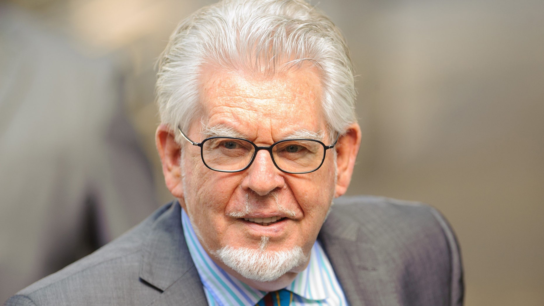 June 30, 2014. Veteran entertainer Rolf Harris arrives at Southwark Crown Court in London.