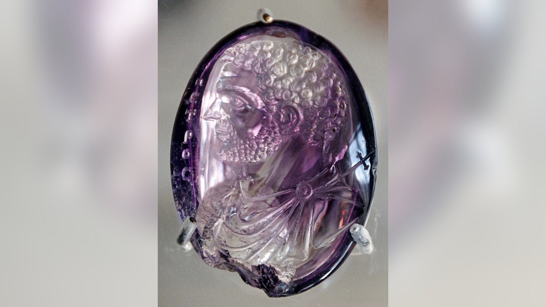 This is a Roman intaglio, or engraved gem, dating from A.D. 212 and held in the treasury of the Sainte-Chapelle in Paris. Intaglios similar to this were sometimes found in roman bath drains.