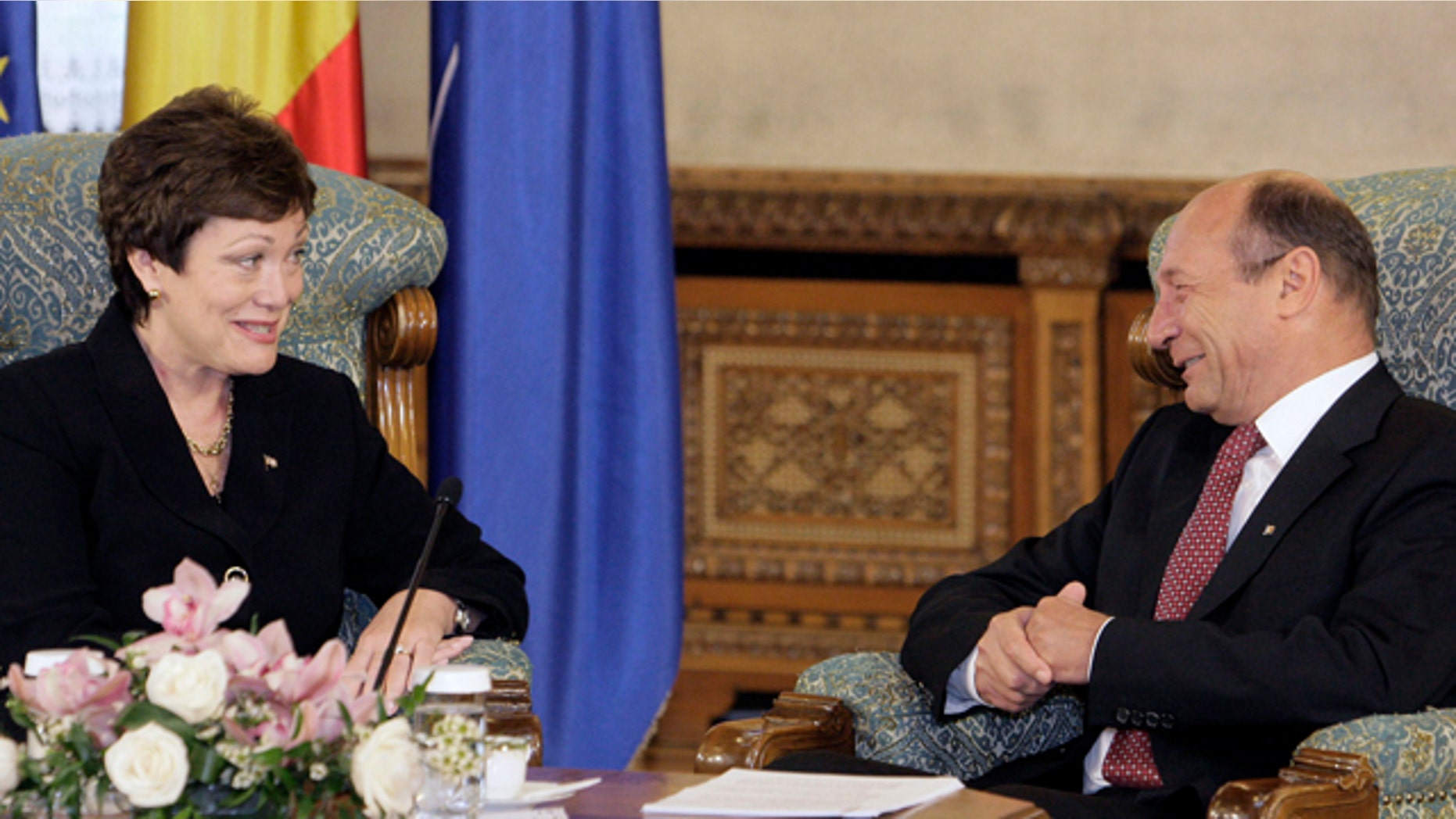 May 3: U.S. Undersecretary of State Ellen Tauscher, left, smiles during the meeting with Romanian President Traian Basescu, right, in Bucharest, Romania. Basescu announced the decision Tuesday in Bucharest to build a missile interceptor site at the Daveselu air base near the Bulgarian border. Romania already had agreed to host the interceptors, but the location had not been announced. (AP)