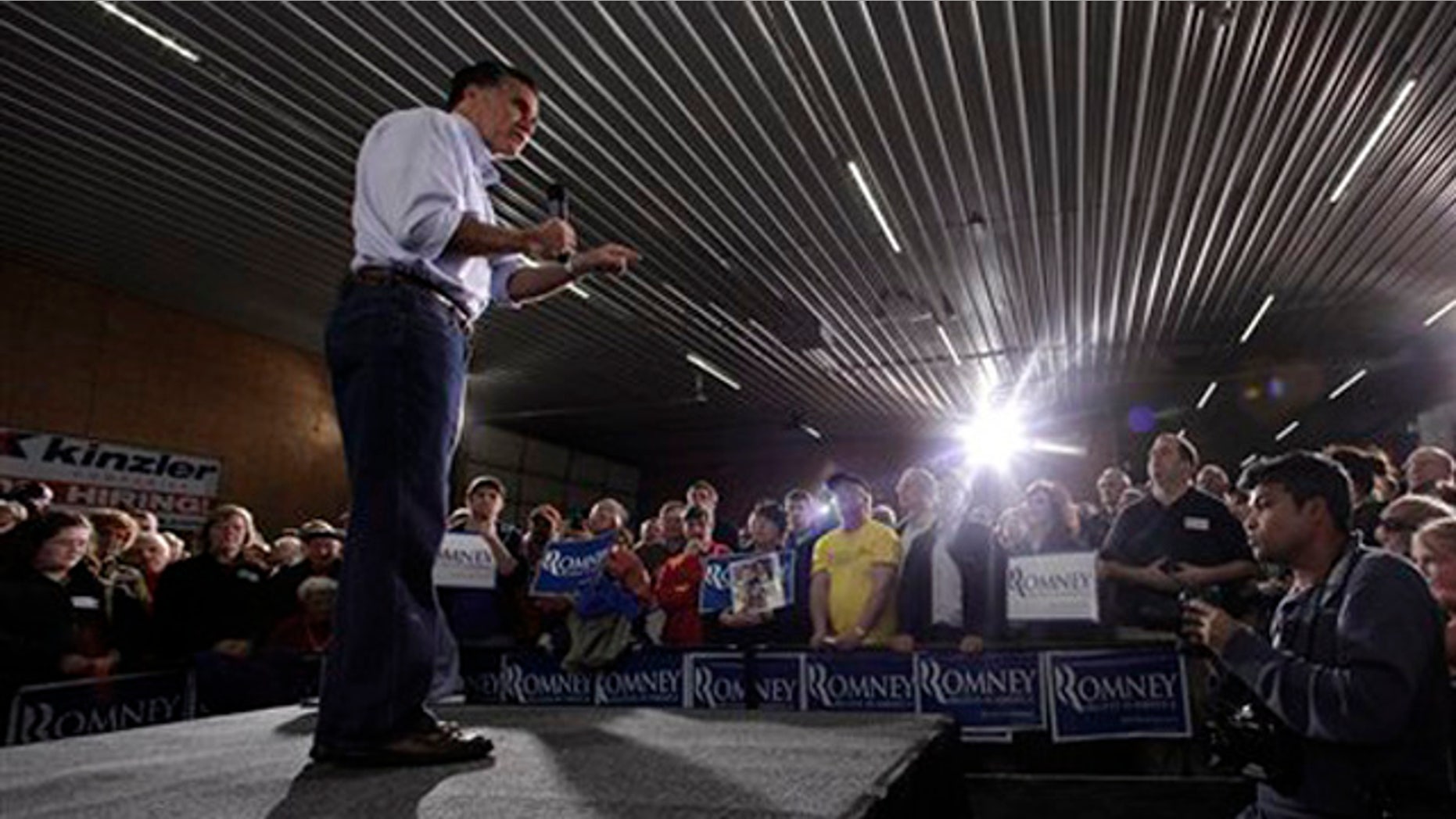 Dec. 29, 2011: Mitt Romney speaks during a campaign stop at Kinzler Construction in Ames, Iowa.