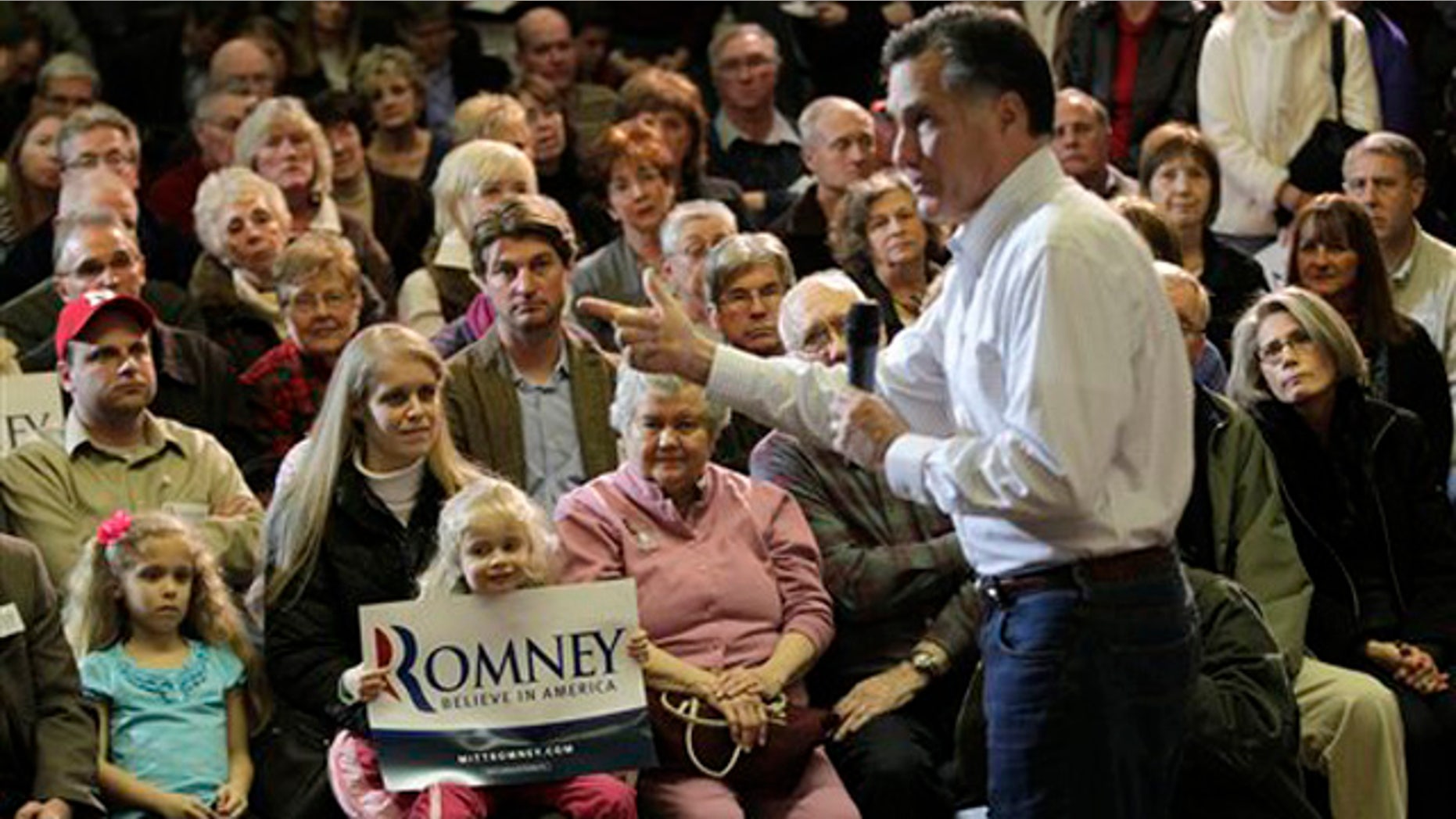 Jan. 1, 2012: Mitt Romney speaks to a packed room during a campaign appearance at the Bayliss Park Hall in Council Bluffs, Iowa.