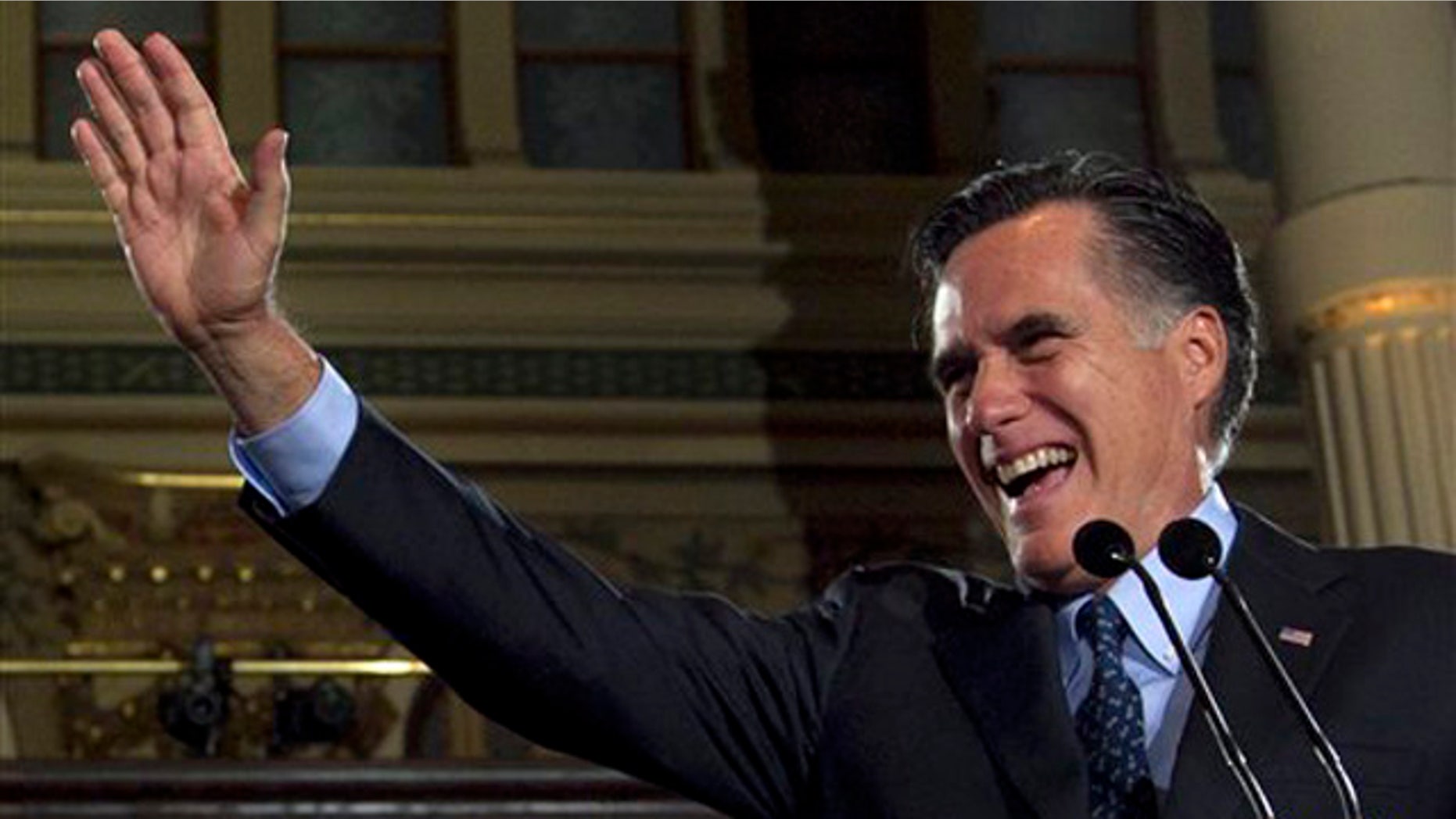 April 3, 2012: Mitt Romney greets the crowd at his primary election night rally in Milwaukee.