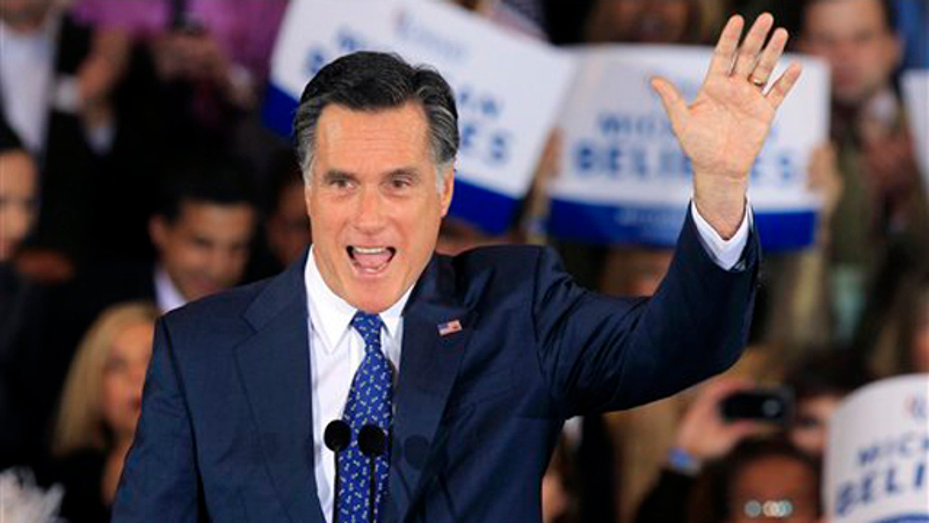Feb. 28, 2012: Mitt Romney waves at his election night party in Novi, Mich.