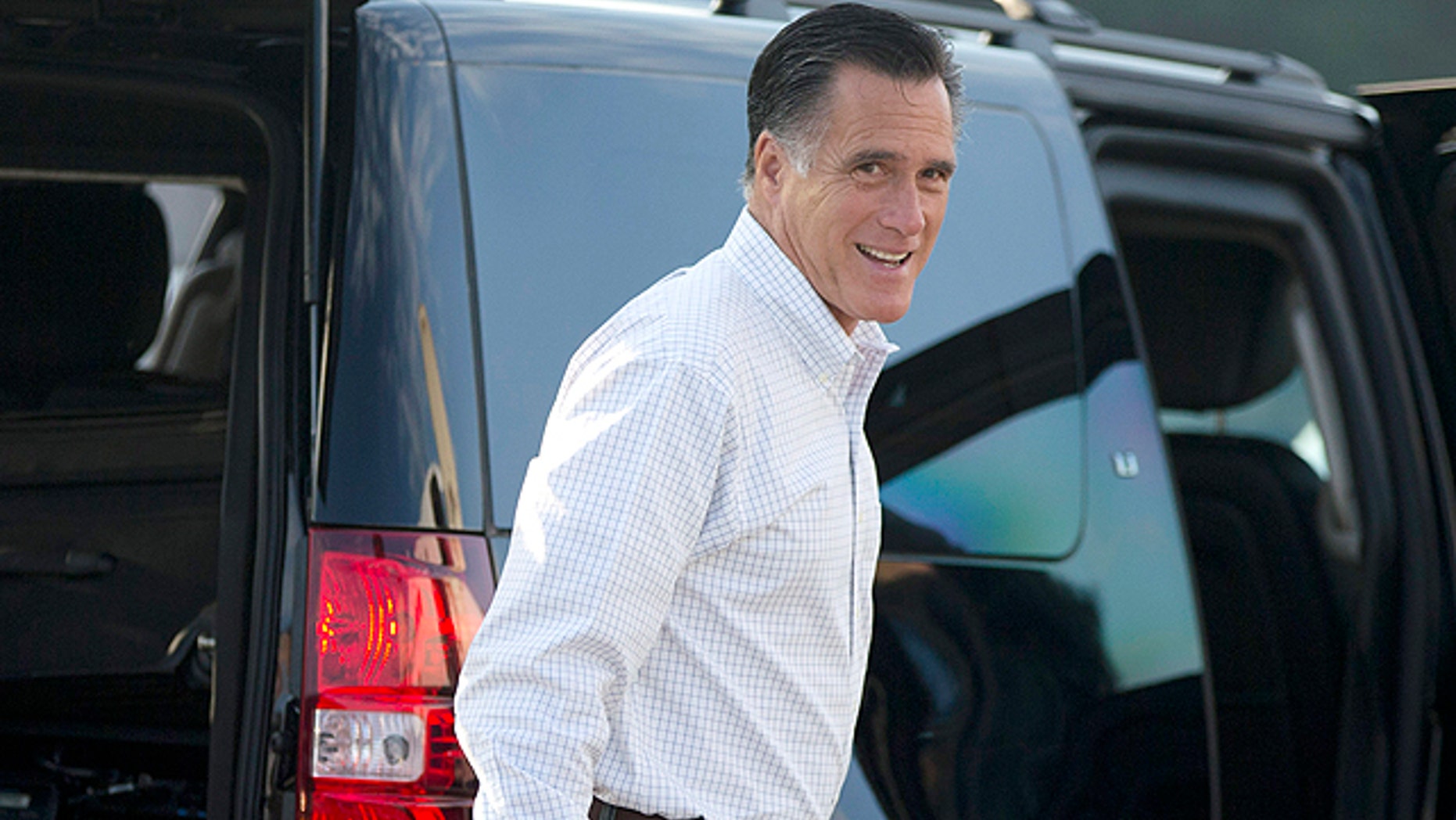 Sept. 7, 2012: Republican presidential candidate, former Massachusetts Gov. Mitt Romney boards his campaign plane for an event in Iowa on Friday in Portsmouth, N.H. (AP)