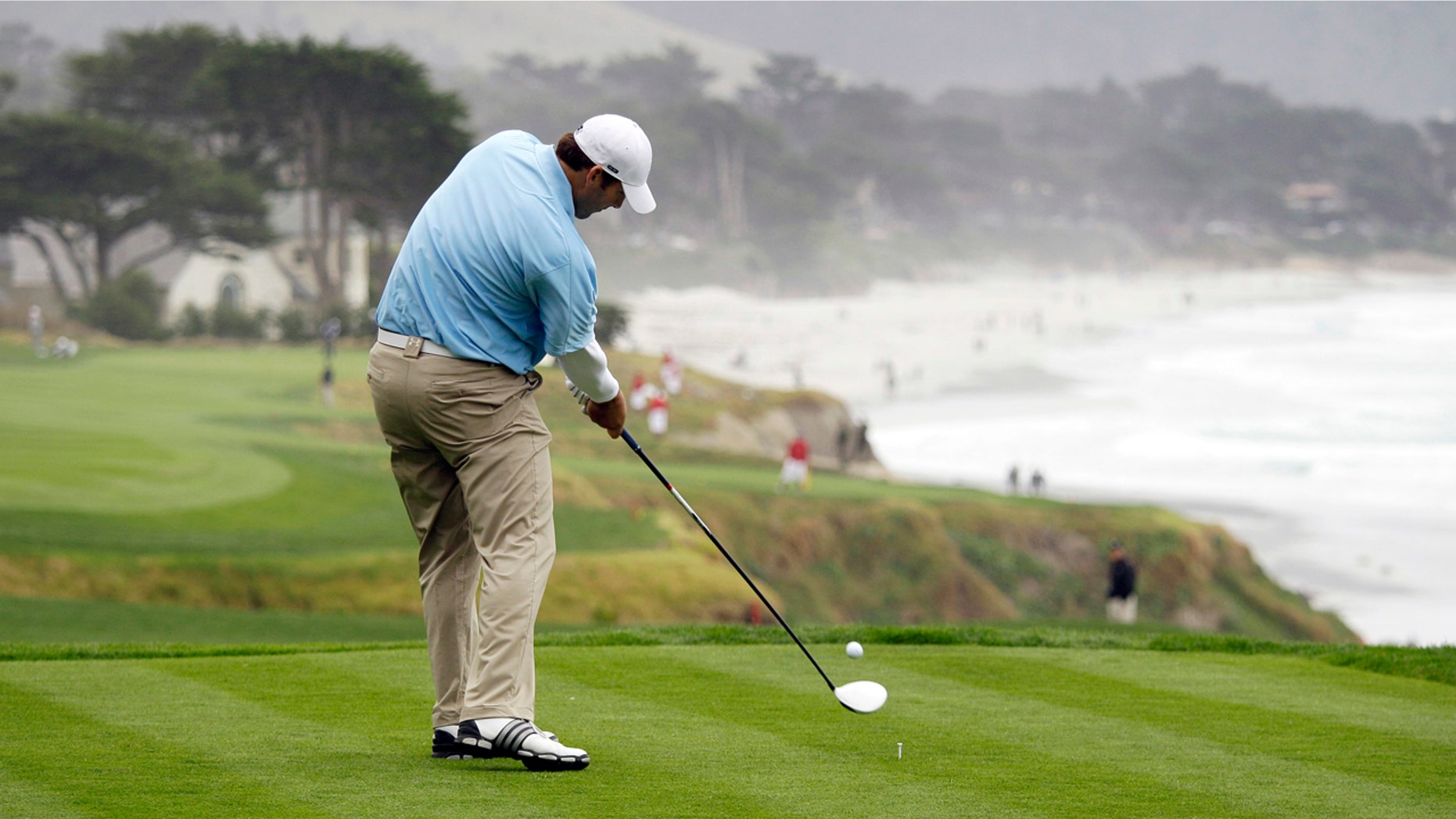 Former Dallas Cowboys quarterback Tony Romo tees off during a practice round ahead of this week's AT&T Pebble Beach National Pro-Am