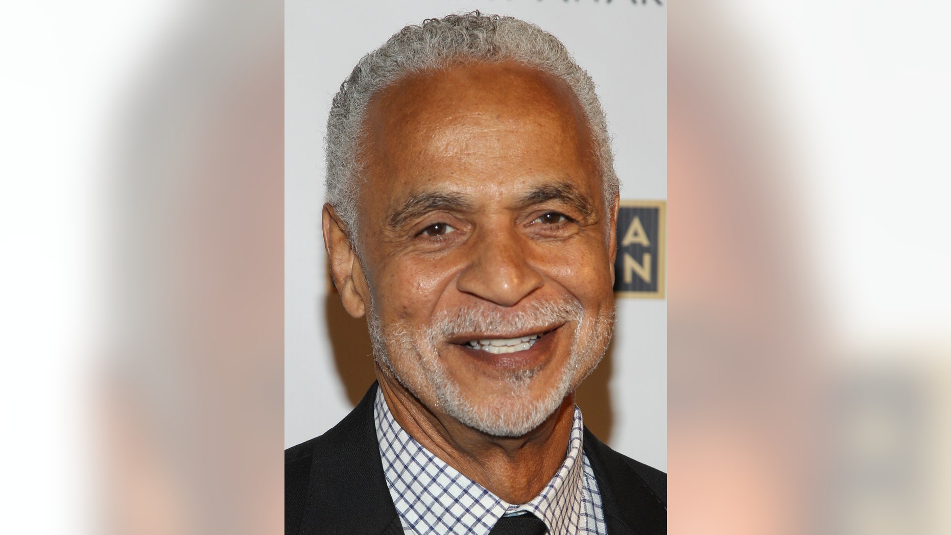 Actor Ron Glass arrives at the Emmy Awards in 2013