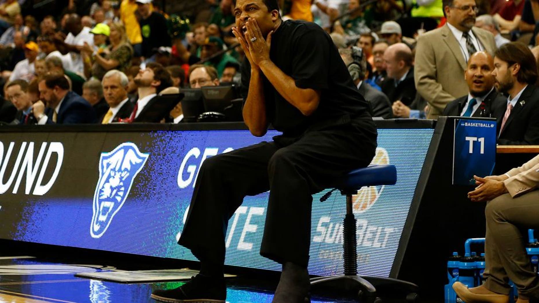 JACKSONVILLE, FL - MARCH 19: Head coach Ron Hunter of the Georgia State Panthers coaches from a chair during the second round of the 2015 NCAA Men's Basketball Tournament at Jacksonville Veterans Memorial Arena on March 19, 2015 in Jacksonville, Florida. Hunter injured his Achilles last week during the Sun Belt Conference tournament championship game. (Photo by Kevin C. Cox/Getty Images)