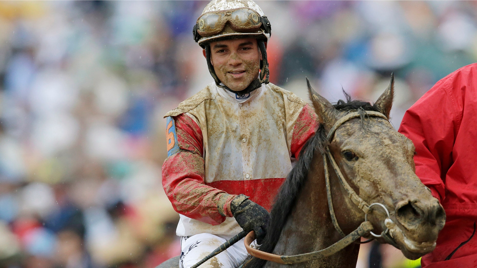 Joel Rosario reacts after riding Orb to victory in the Kentucky Derby at Churchill Downs Saturday, May 4, 2013, in Louisville, Ky.