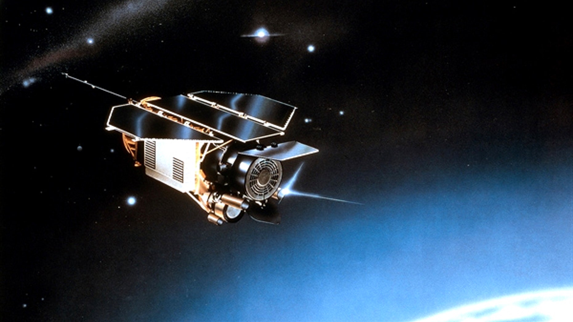 An artist's impression of the German ROSAT satellite orbiting in space.